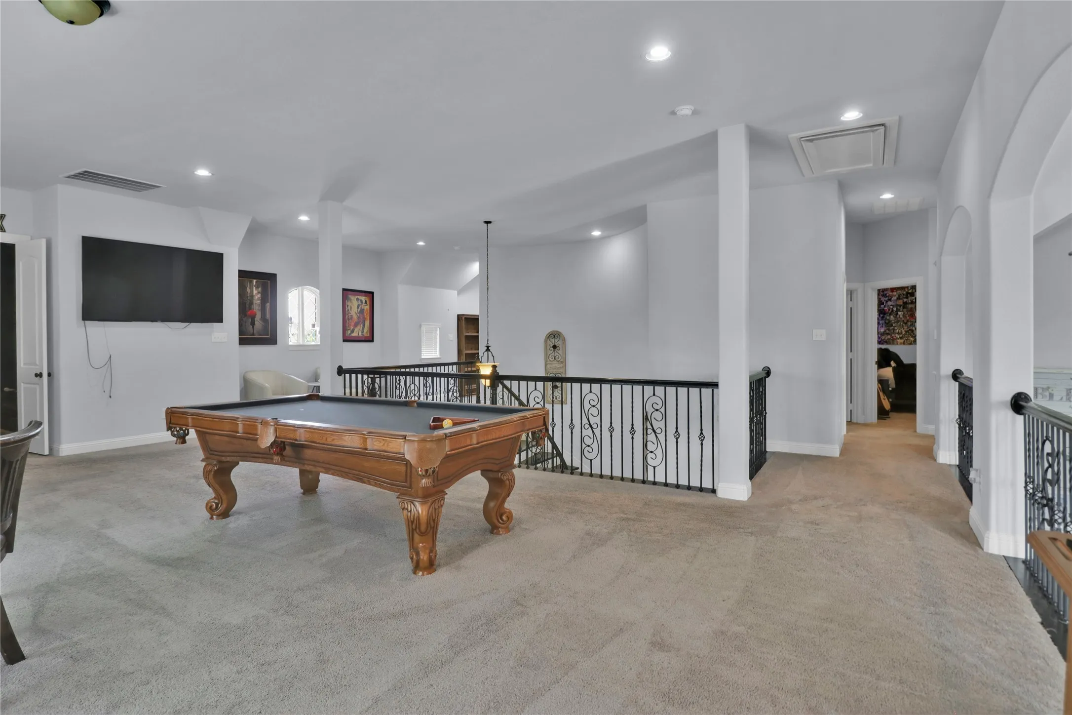 Hall to right leads to the 3 bedrooms and 2 baths.