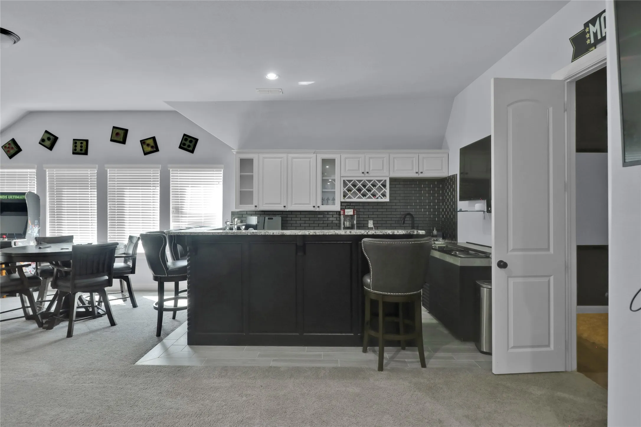Upstairs family room is perfect for entertaining guests.