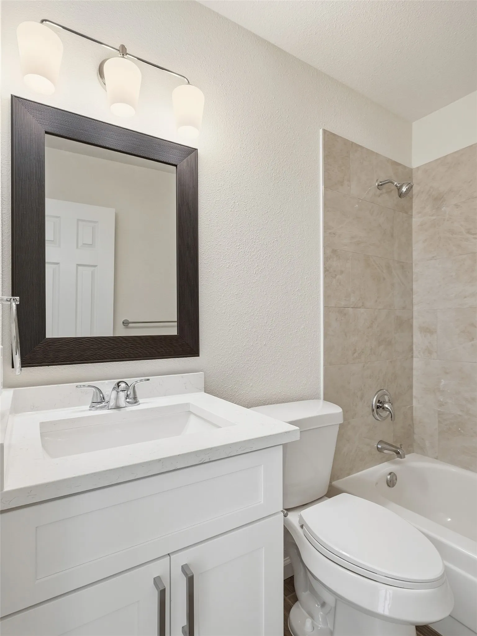 Vanity with integrated sink and chrome fixtures