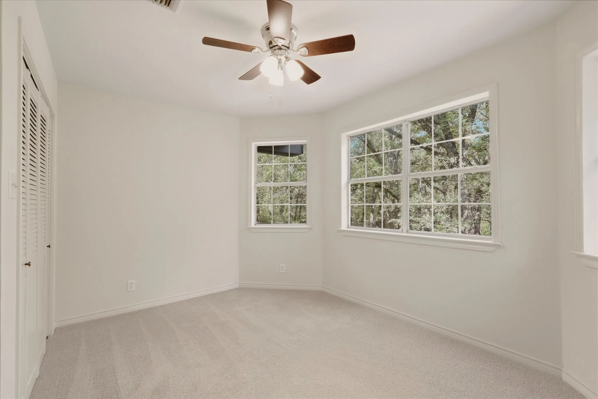 Second bedroom upstairs, with closet on the left.