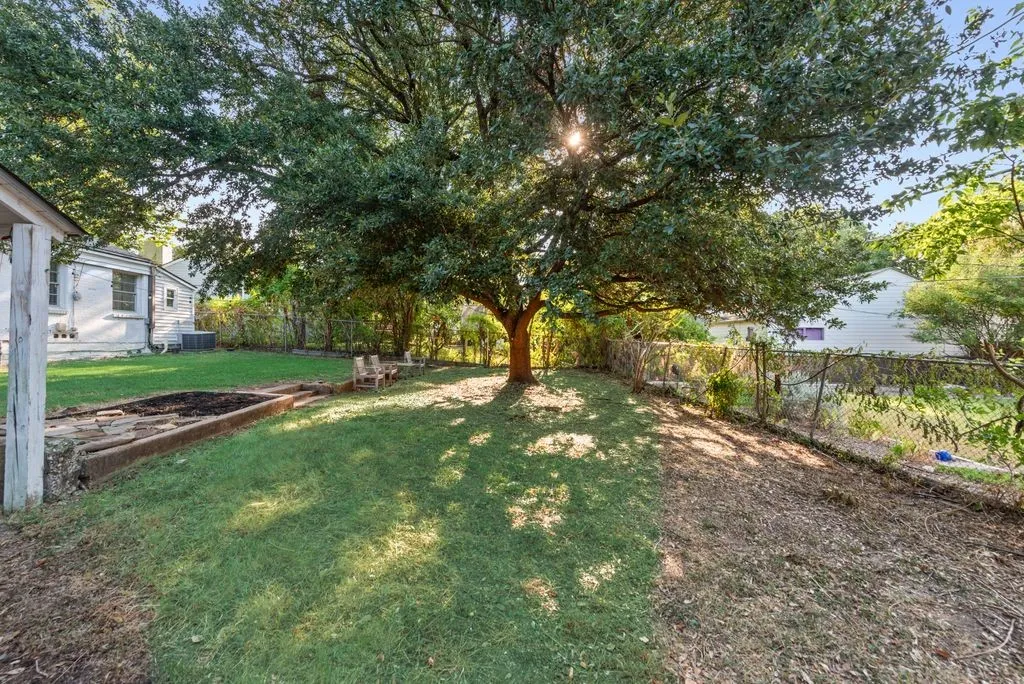 Watch the sunset filter through the branches while the kids play in the grass.