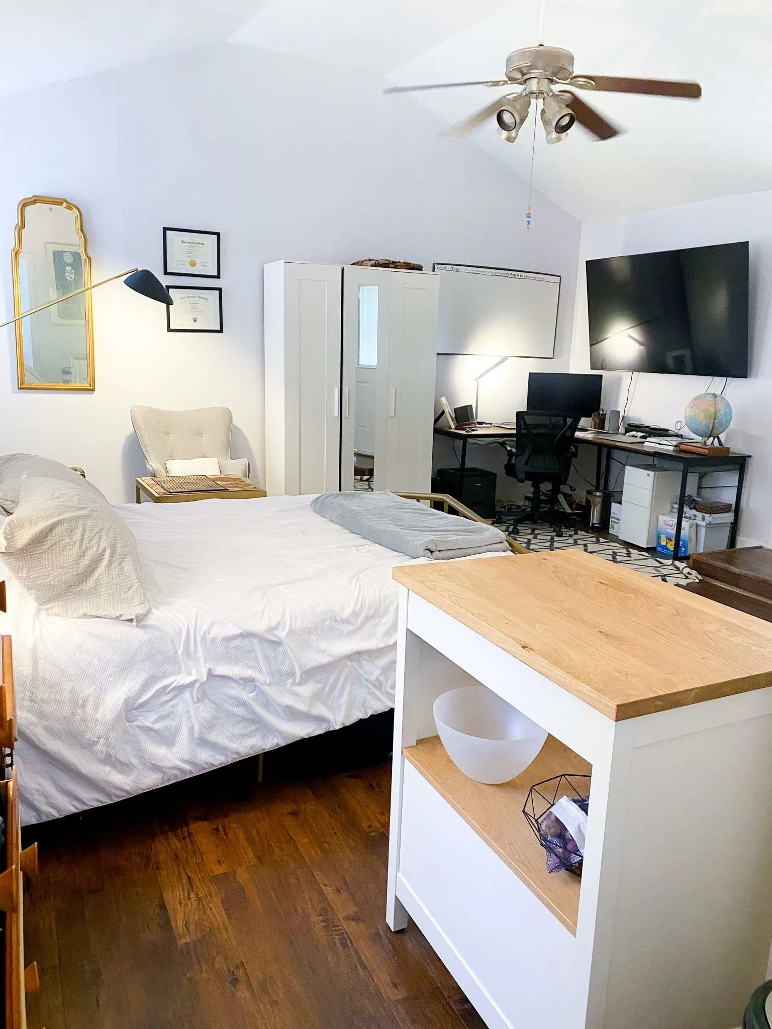 Vaulted ceilings and rich wood floors make this open studio feel bright, spacious, and ready to move right in.