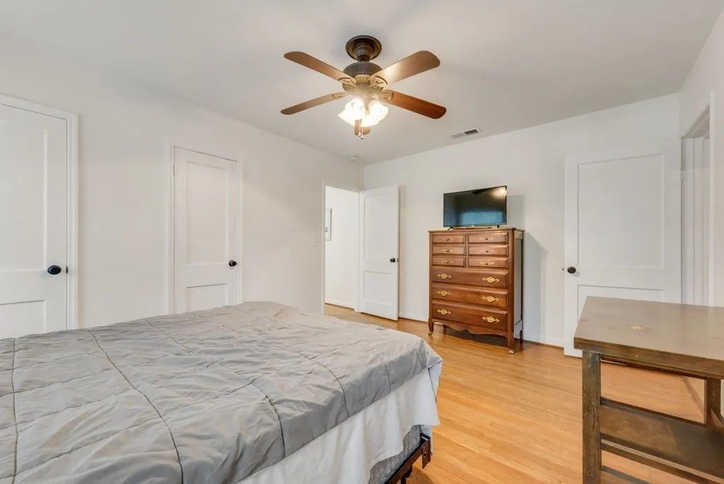 Plenty of space for a king bed, dresser, and desk, with closets to keep it all organized.