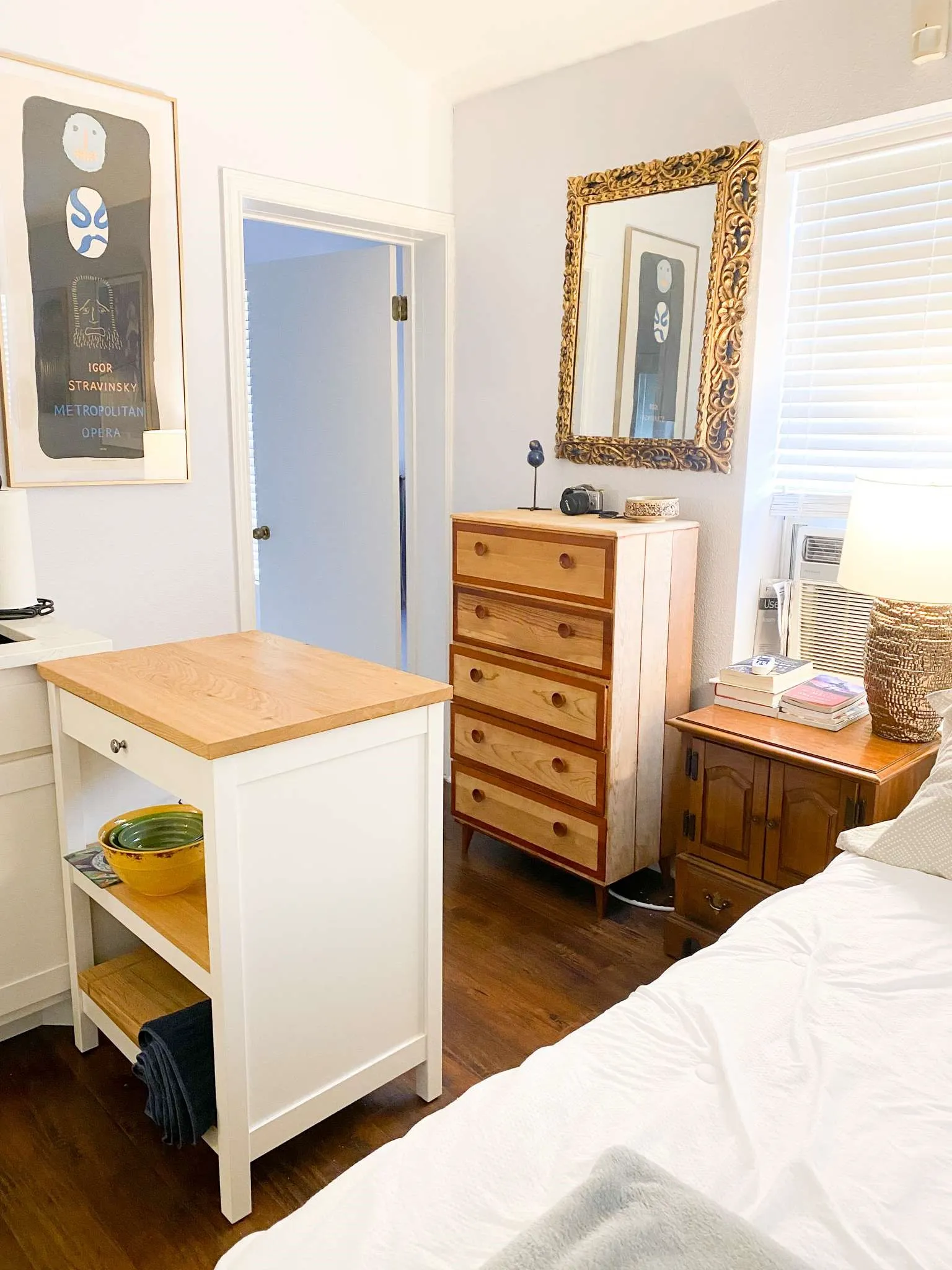 Room for a dresser, nightstand, and a butcher block island for extra prep space or storage.