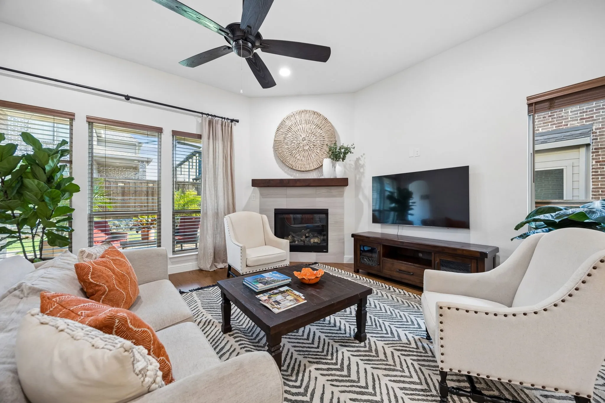 Corner fireplace anchors the Living area