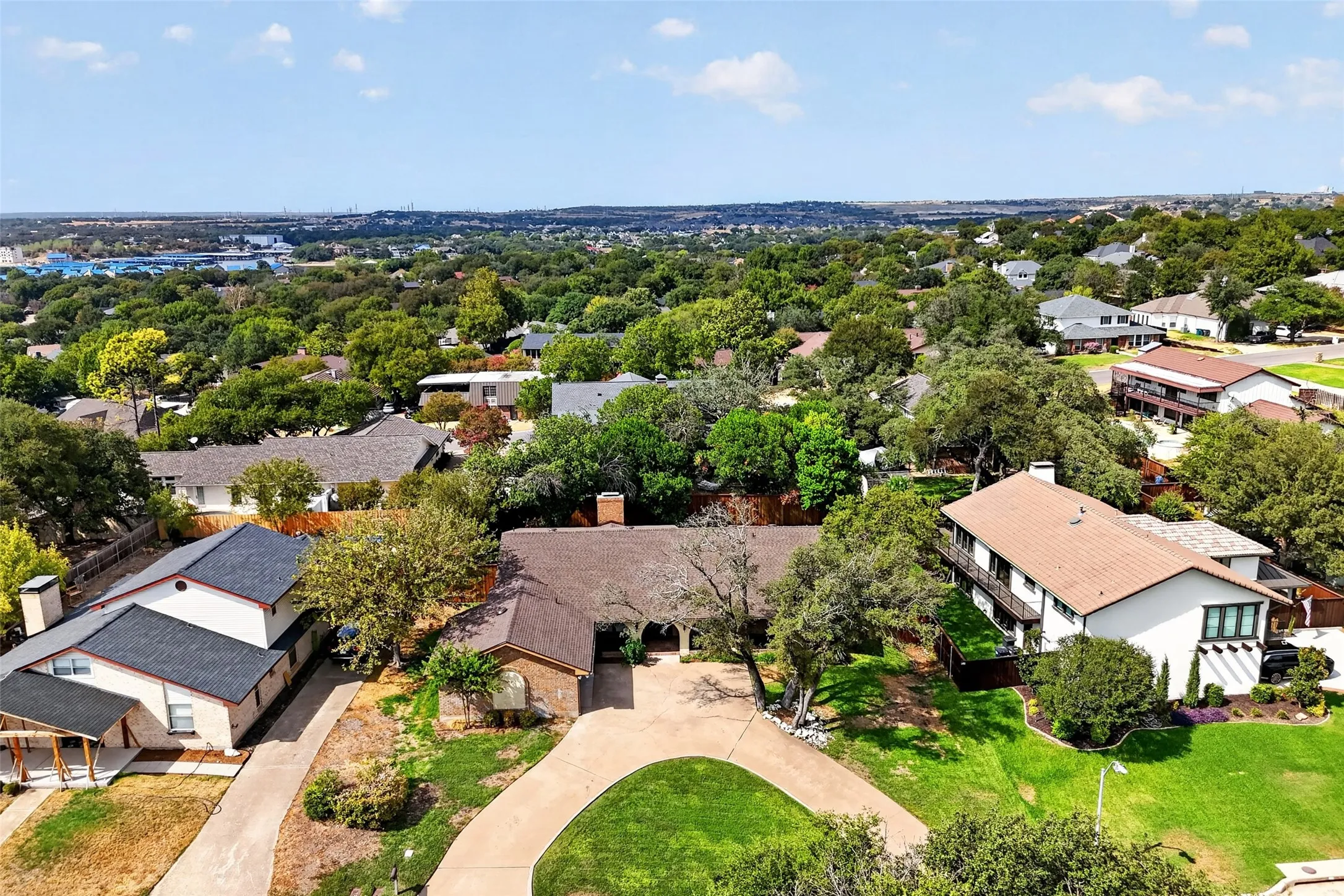 Beautiful curb appeal with circle drive