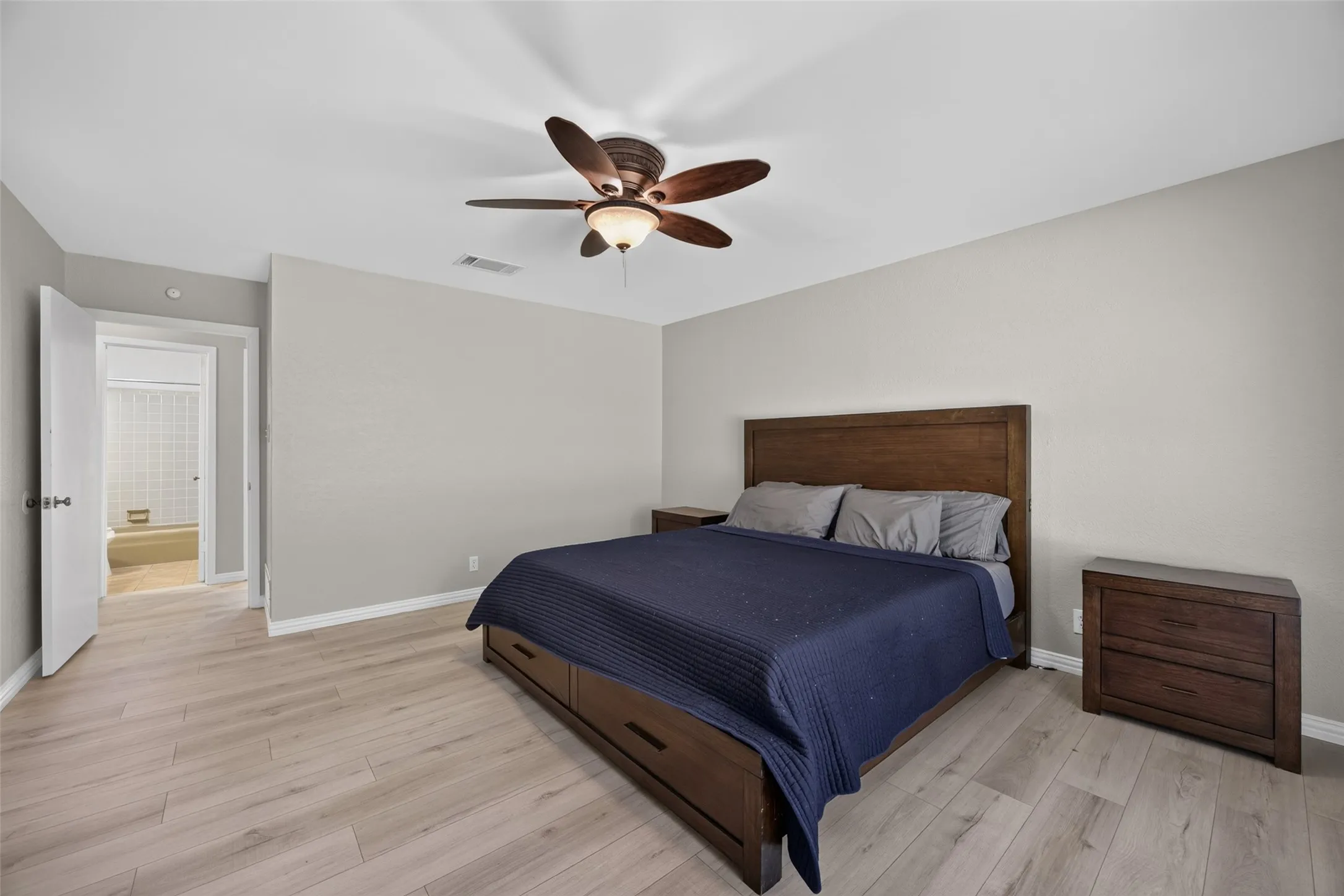 Pretty primary bedroom with en-suite bathroom