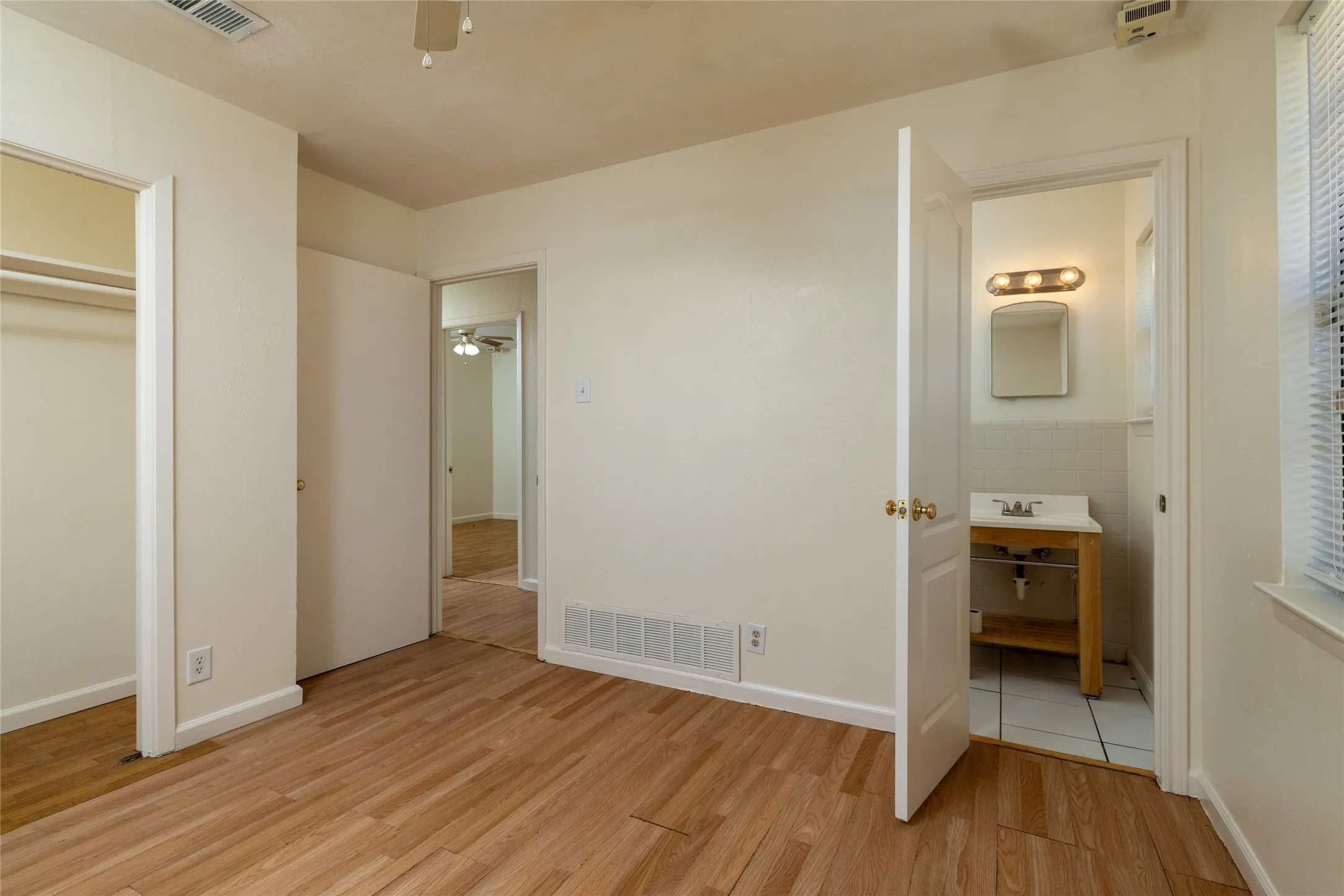This bedroom has a half bath!