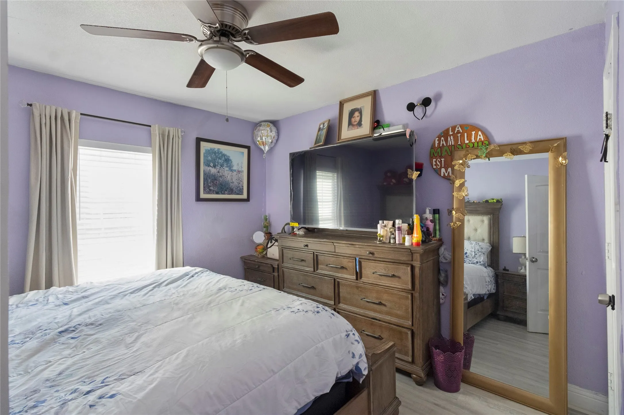Recessed window with blinds and drapes
