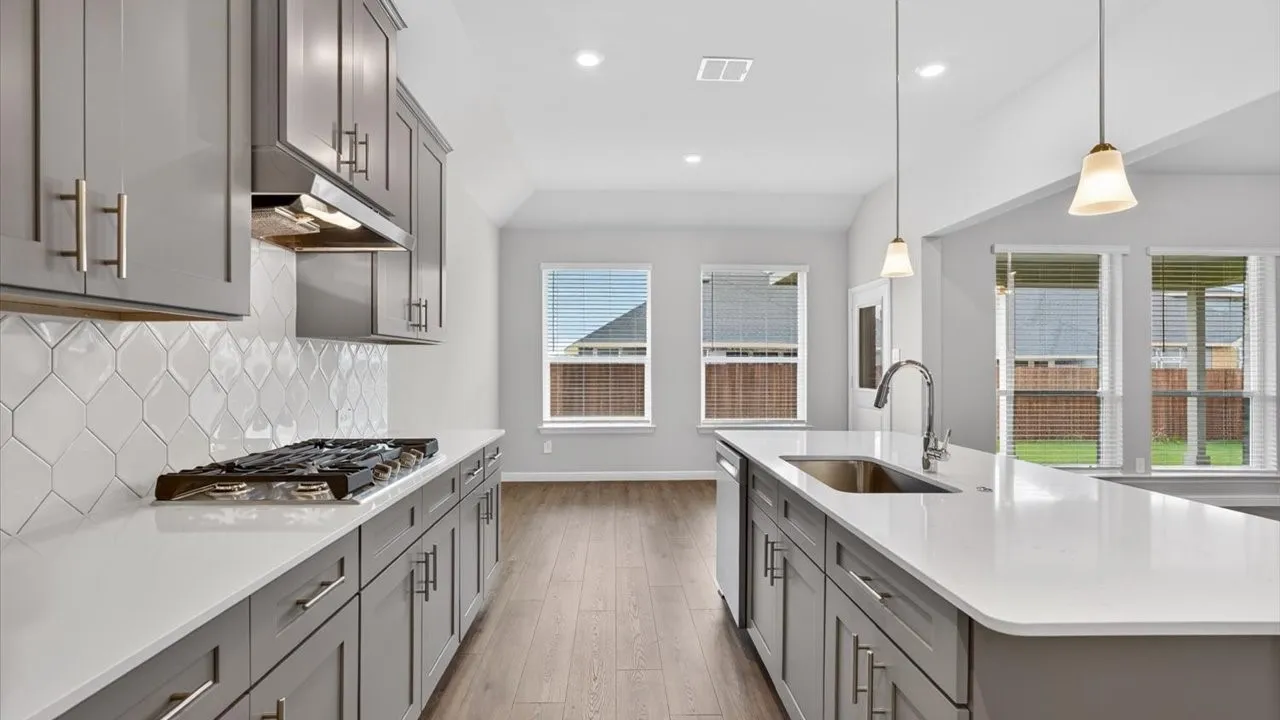 Kitchen - All Home and community information, including pricing, included features, terms, availability and amenities, are subject to change at any time without notice or obligation. All Drawings, pictures, photographs, video, square footages, floor plans, elevations, features, colors and sizes are approximate for illustration purposes only and will vary from the homes as built.
