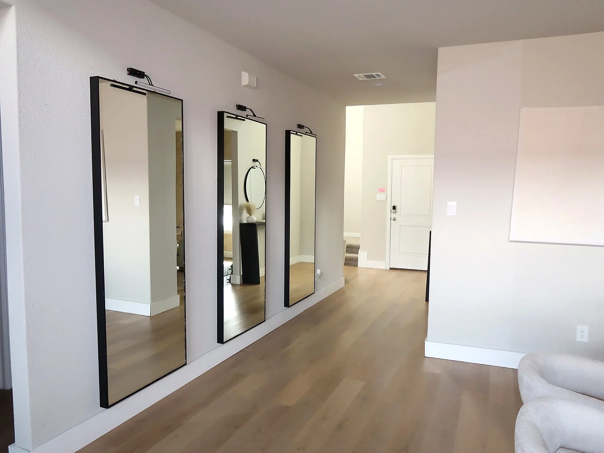 Hardwood-finish flooring extending throughout the space