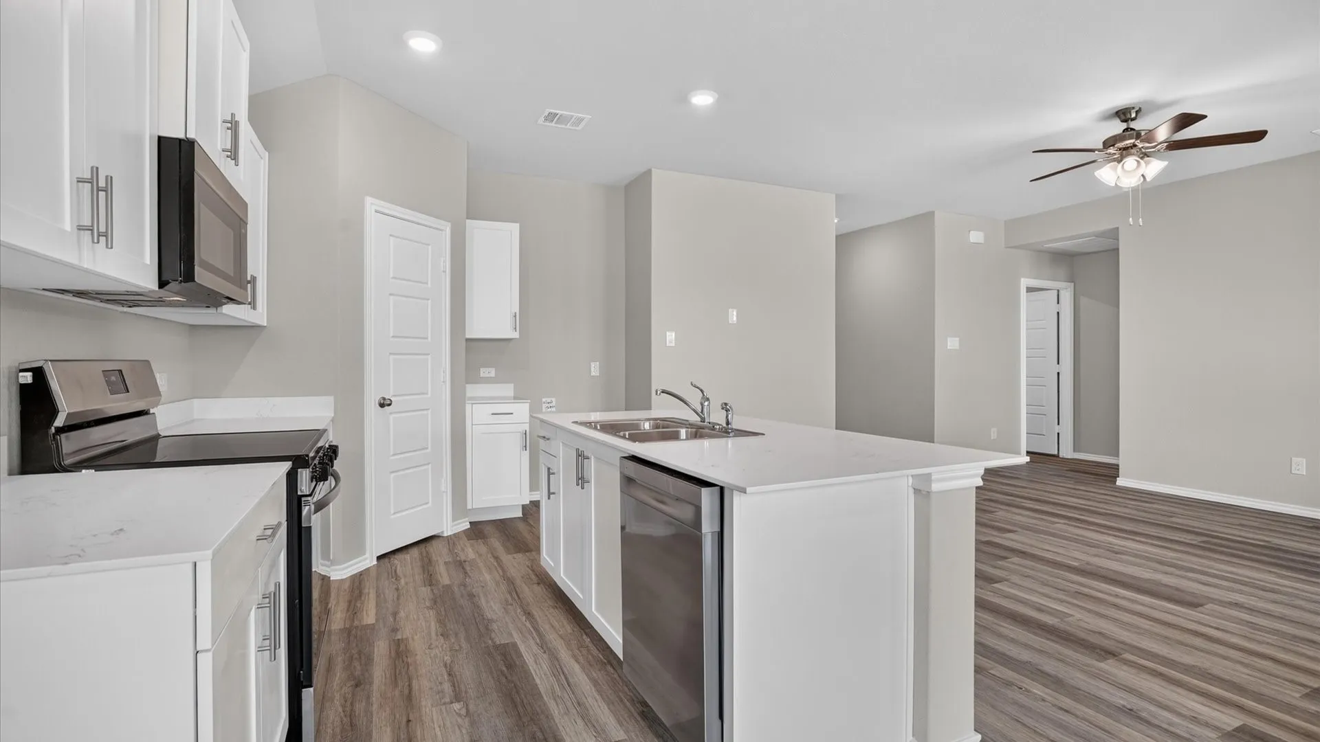 Kitchen - All Home and community information, including pricing, included features, terms, availability and amenities, are subject to change at any time without notice or obligation. All Drawings, pictures, photographs, video, square footages, floor plans, elevations, features, colors and sizes are approximate for illustration purposes only and will vary from the homes as built.
