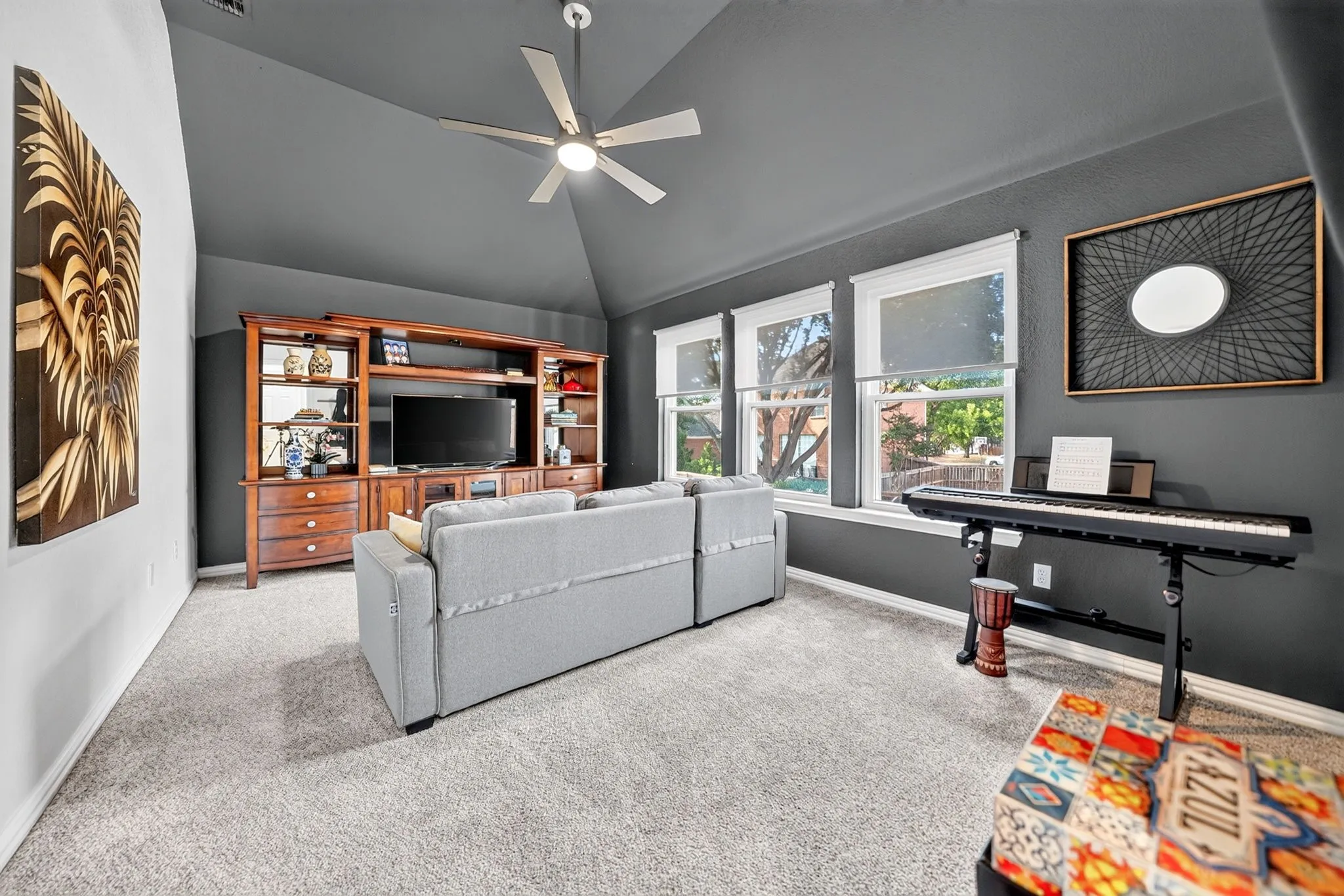 Vaulted ceiling with an attached ceiling fan