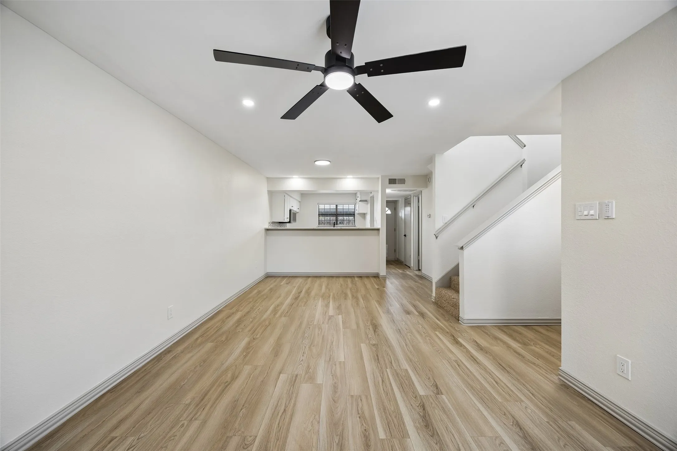 Wood-finish flooring throughout the main level