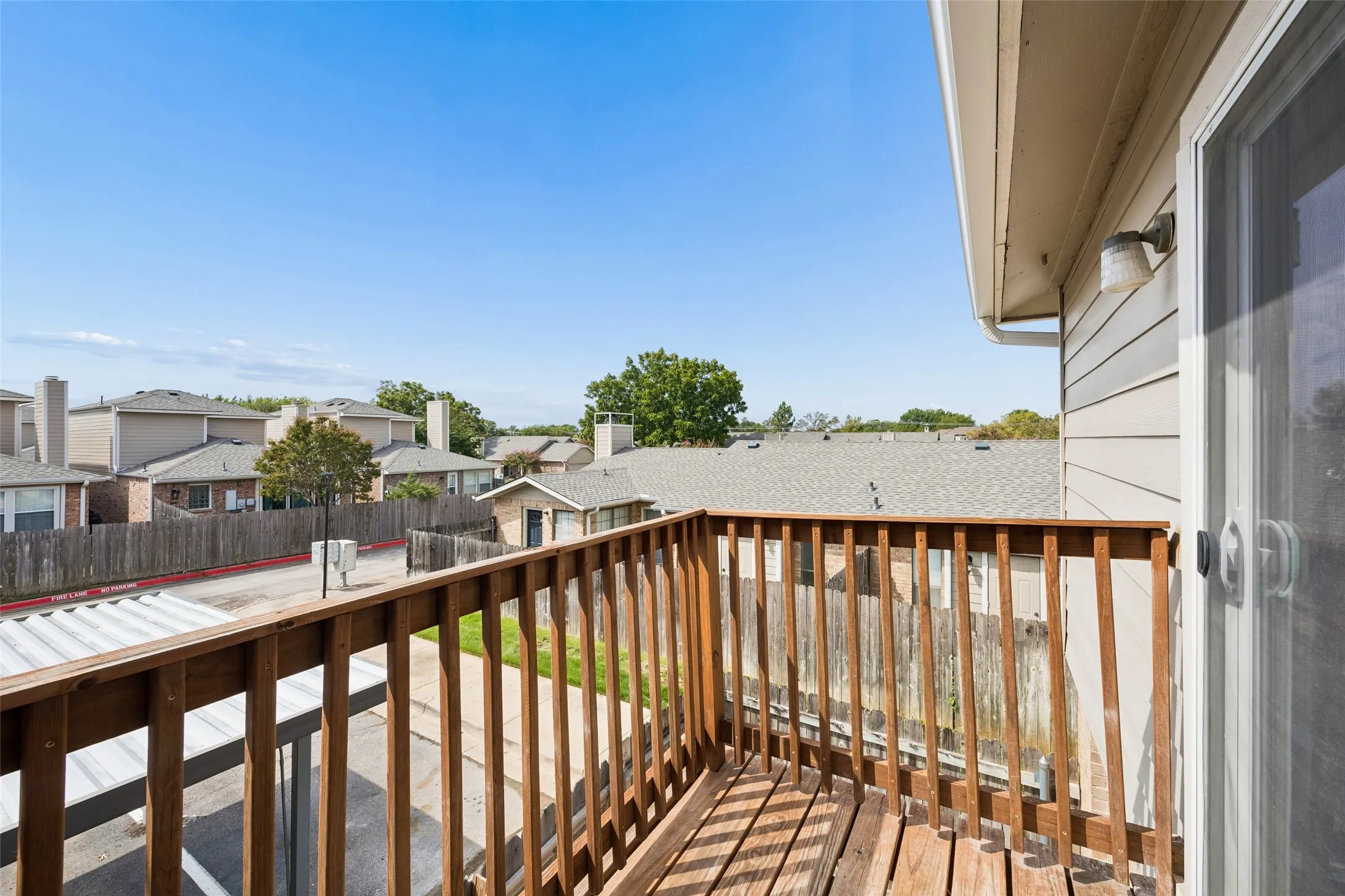 Wood-plank balcony with wood railings