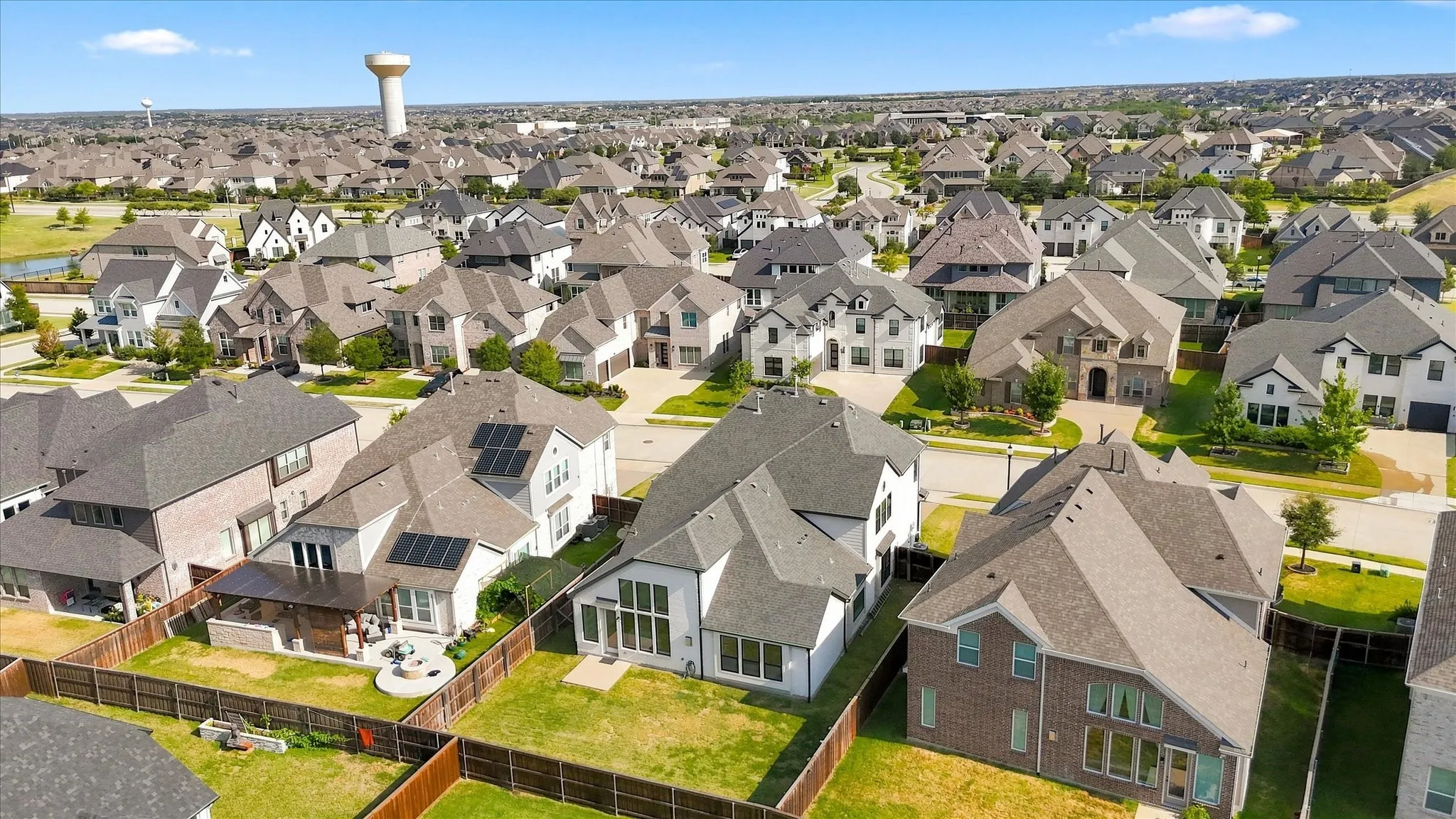 Residential neighborhood featuring multiple architectural styles and mature landscaping
