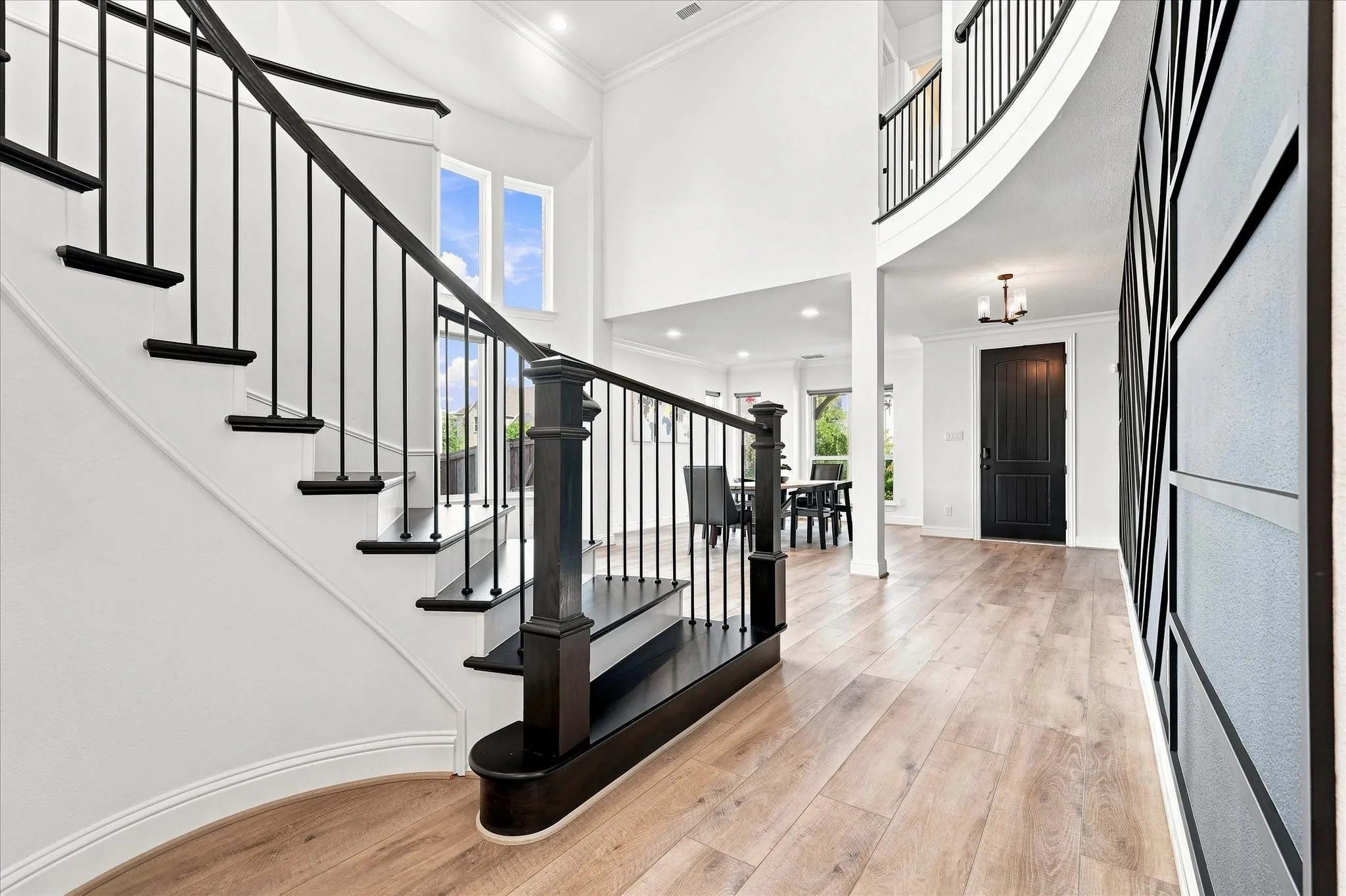 Beautiful dark wood stained spiral staircase