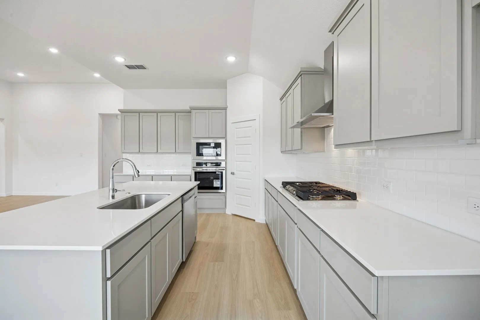 Kitchen in the Gilmour II home plan by Trophy Signature Homes – REPRESENTATIVE PHOTO