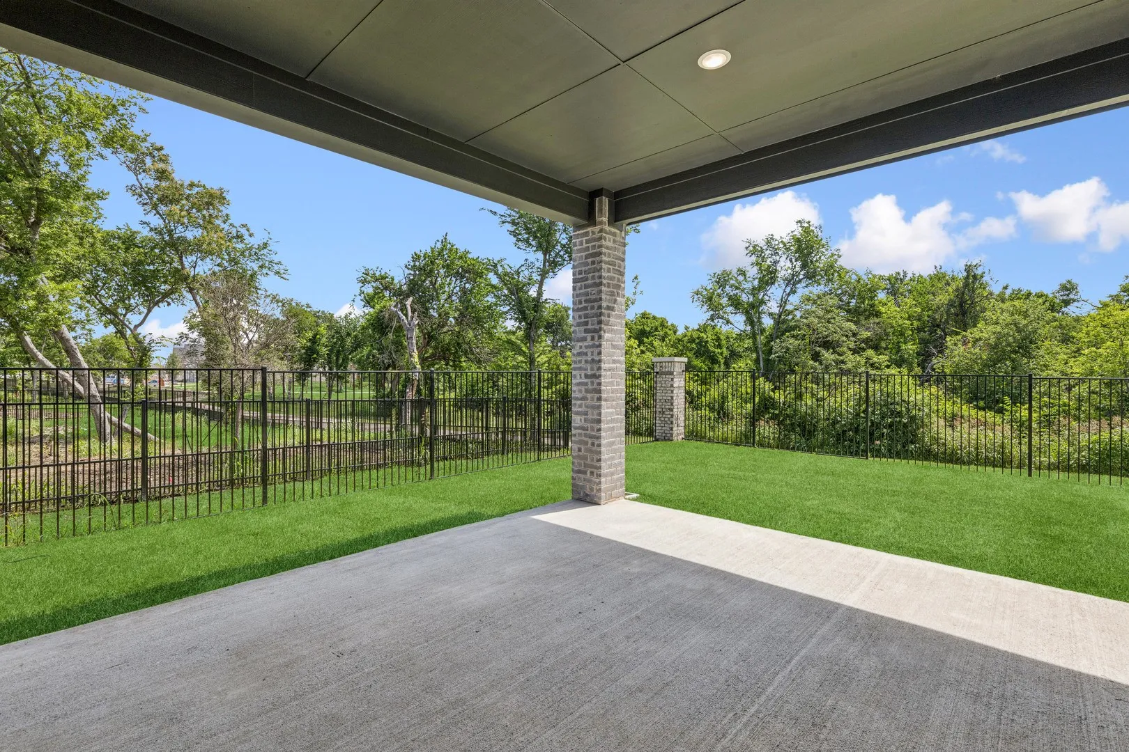 Covered Patio in the Da Vinci II home plan by Trophy Signature Homes – REPRESENTATIVE PHOTO