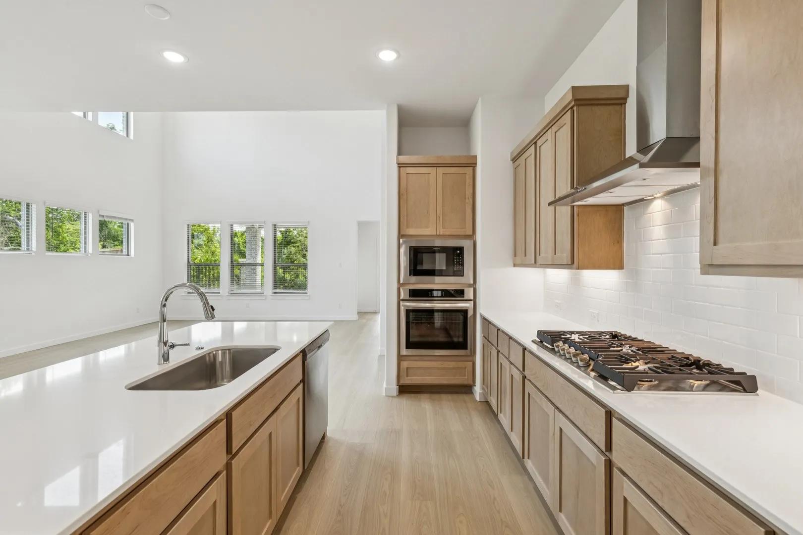 Kitchen in the Da Vinci II home plan by Trophy Signature Homes – REPRESENTATIVE PHOTO