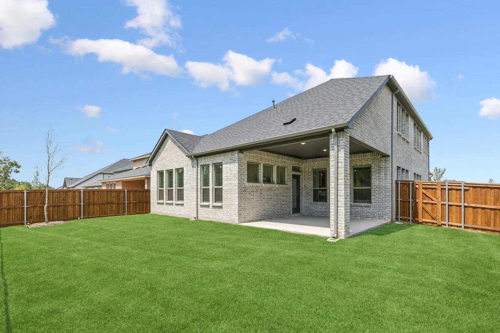 Covered Patio in the Da Vinci II home plan by Trophy Signature Homes – REPRESENTATIVE PHOTO