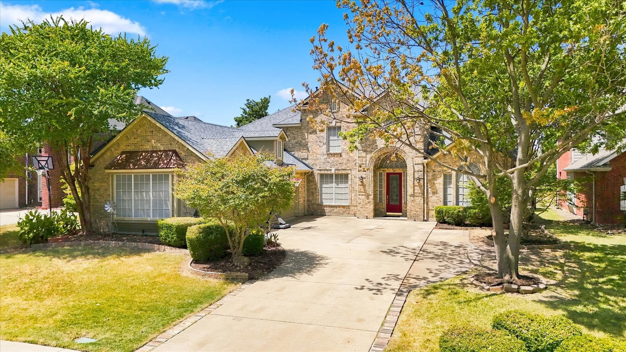 Enjoy 3 car garage on 18th hole of Waterview Golf Course