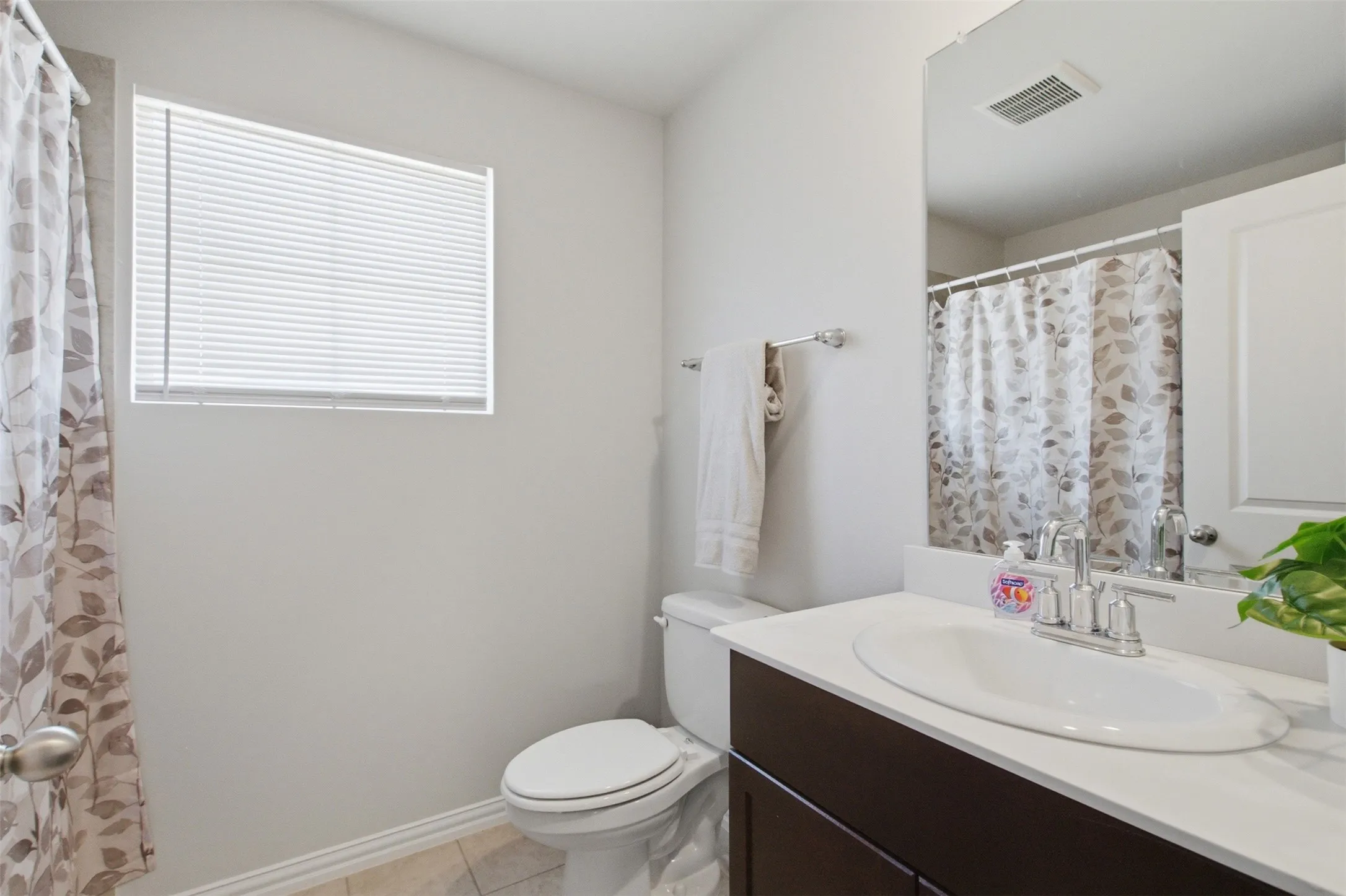 White countertop vanity with integrated sink