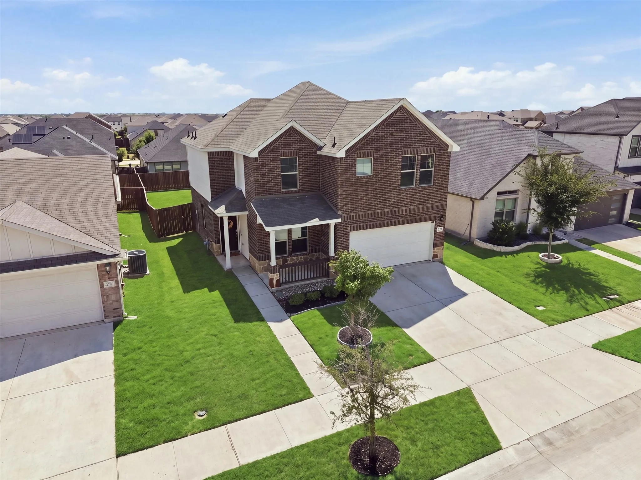Brick exterior with white trim details