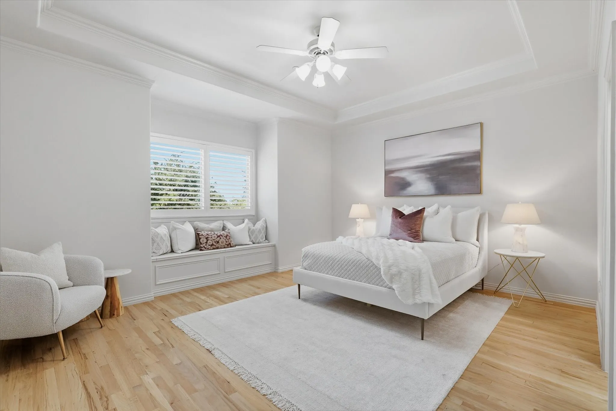 A second upstairs bedroom continues the home's light, refined palette and generous proportions.