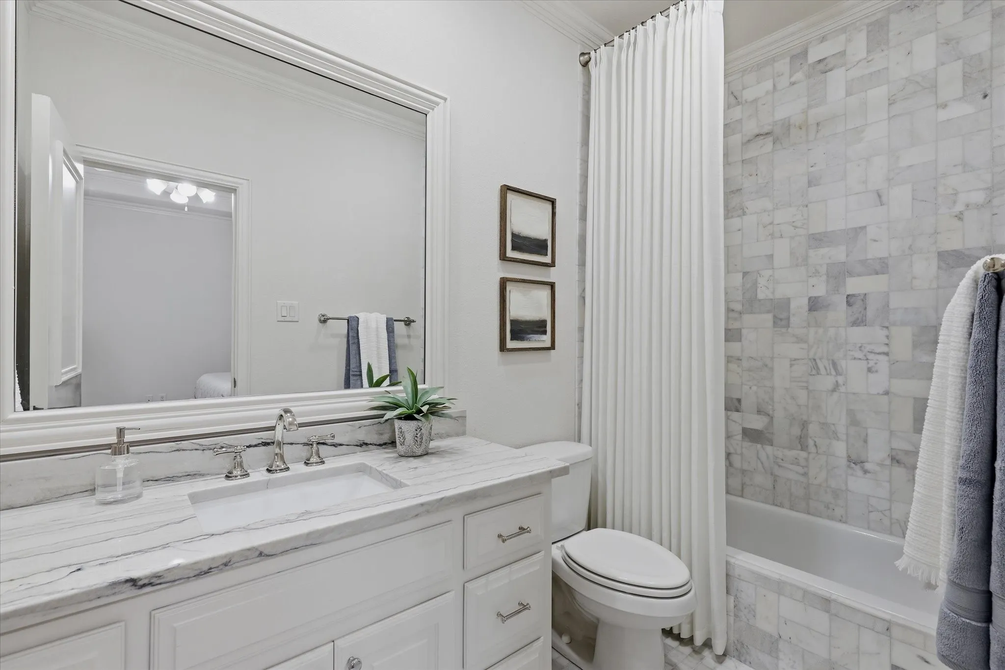 A beautifully updated ensuite bath completes this private upstairs bedroom suite.