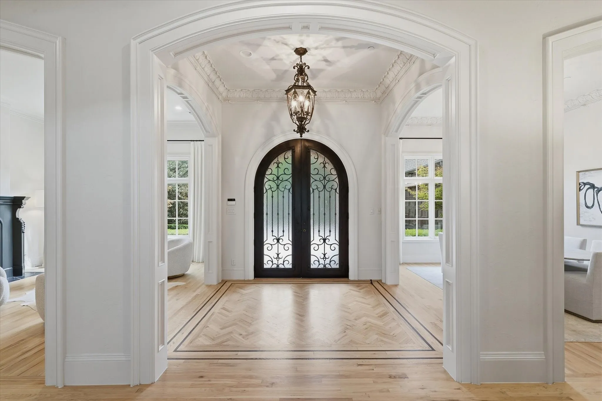 Inside, light-filled interiors unfold with quiet sophistication.