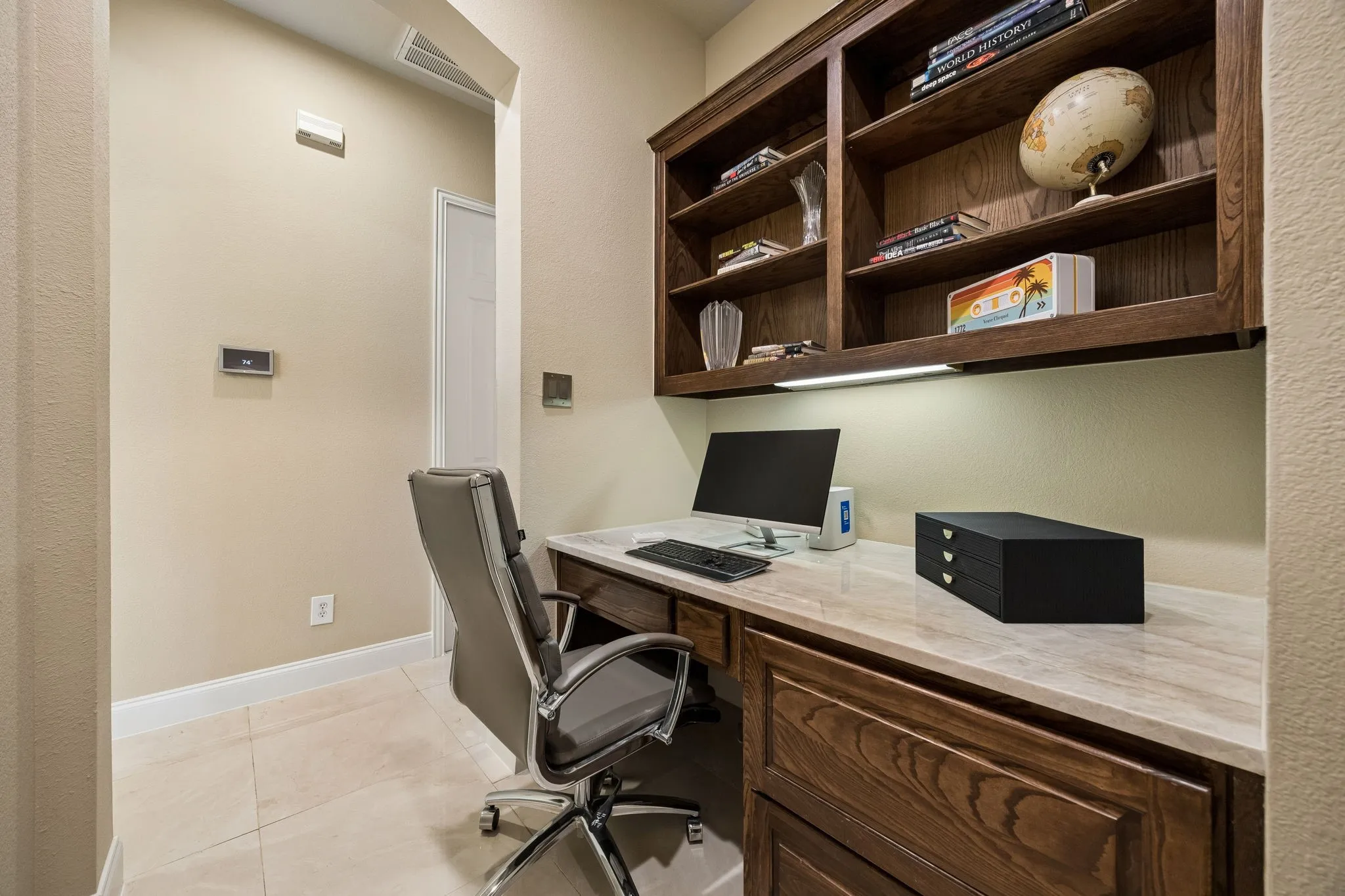 Perfectly positioned near the kitchen and primary suite, this dedicated workspace offers both convenience and versatility.  Ideal for a home office or homework station.