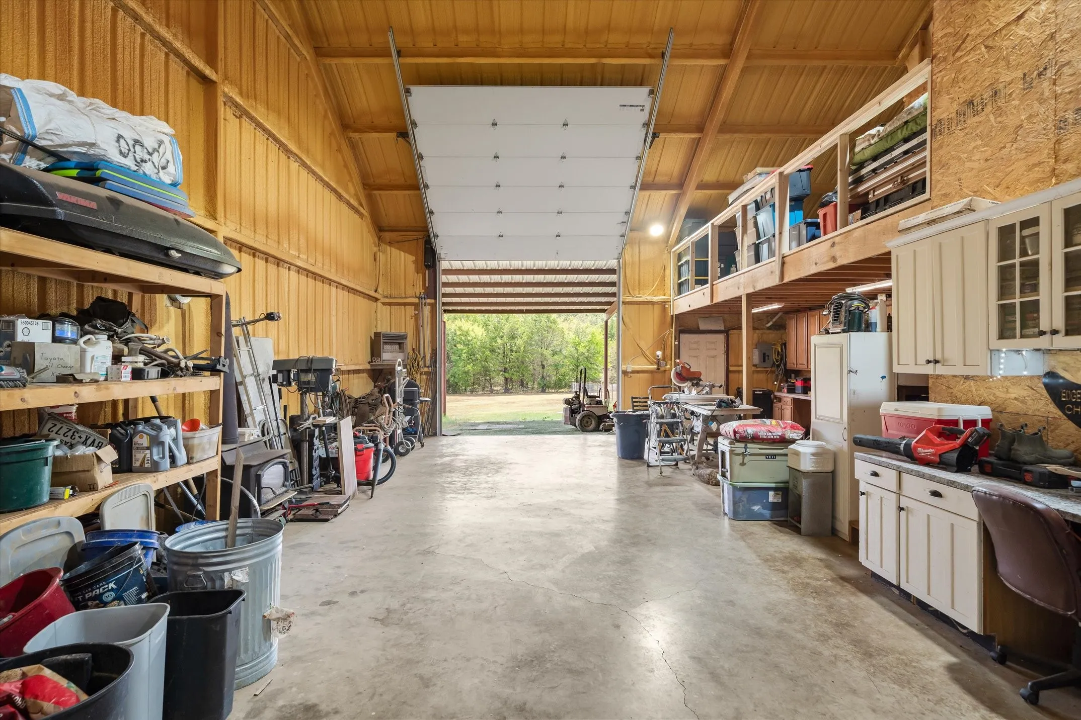 1200 SF insulated shop with two commercial bay doors a wood burning stove that will heat the shop