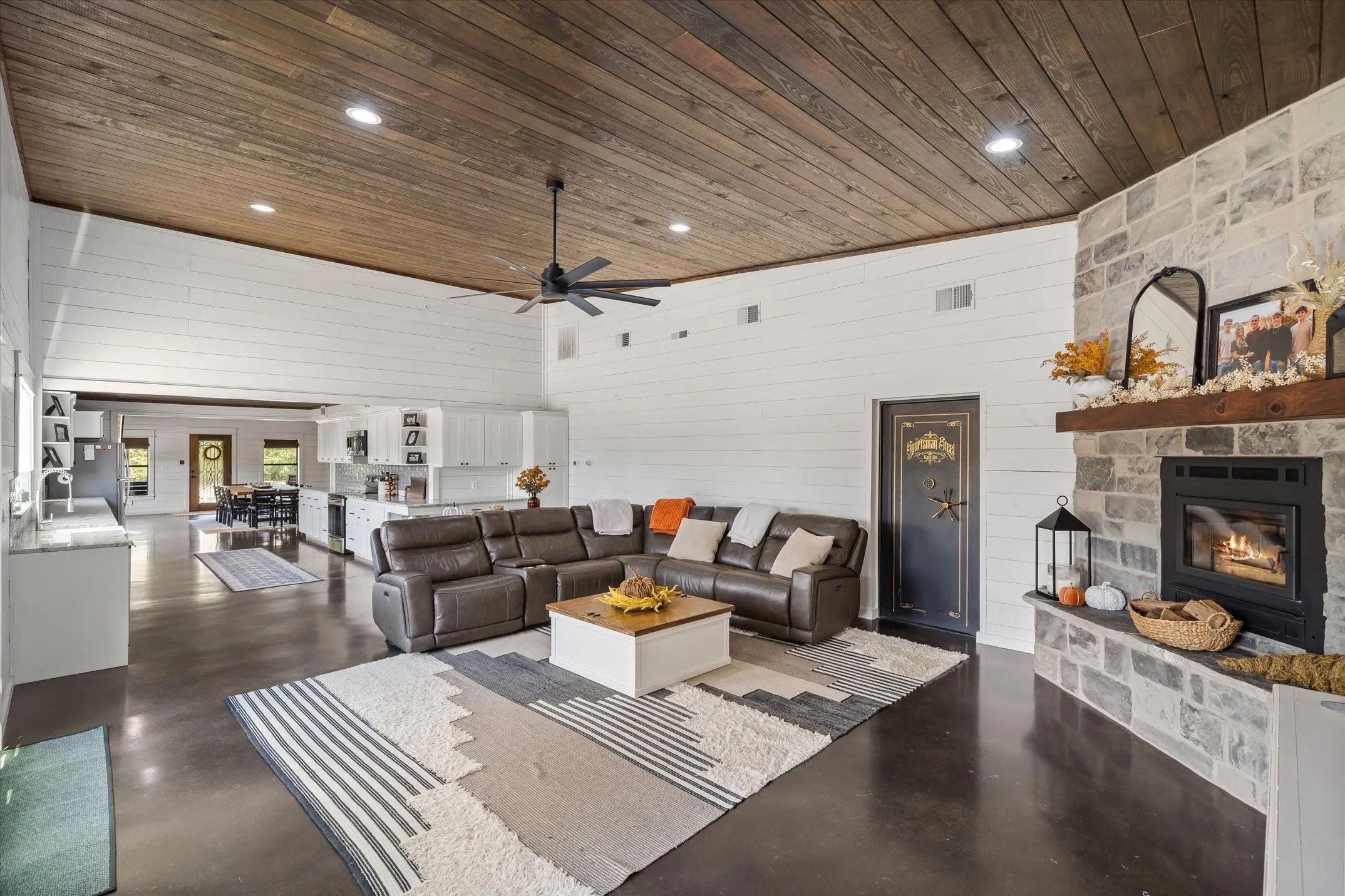 This temp controlled fireplace will heat the home.  The safe room is just off the LR and has a 2500 lb combination door 8" concrete walls, ceiling and poured with the slab.
