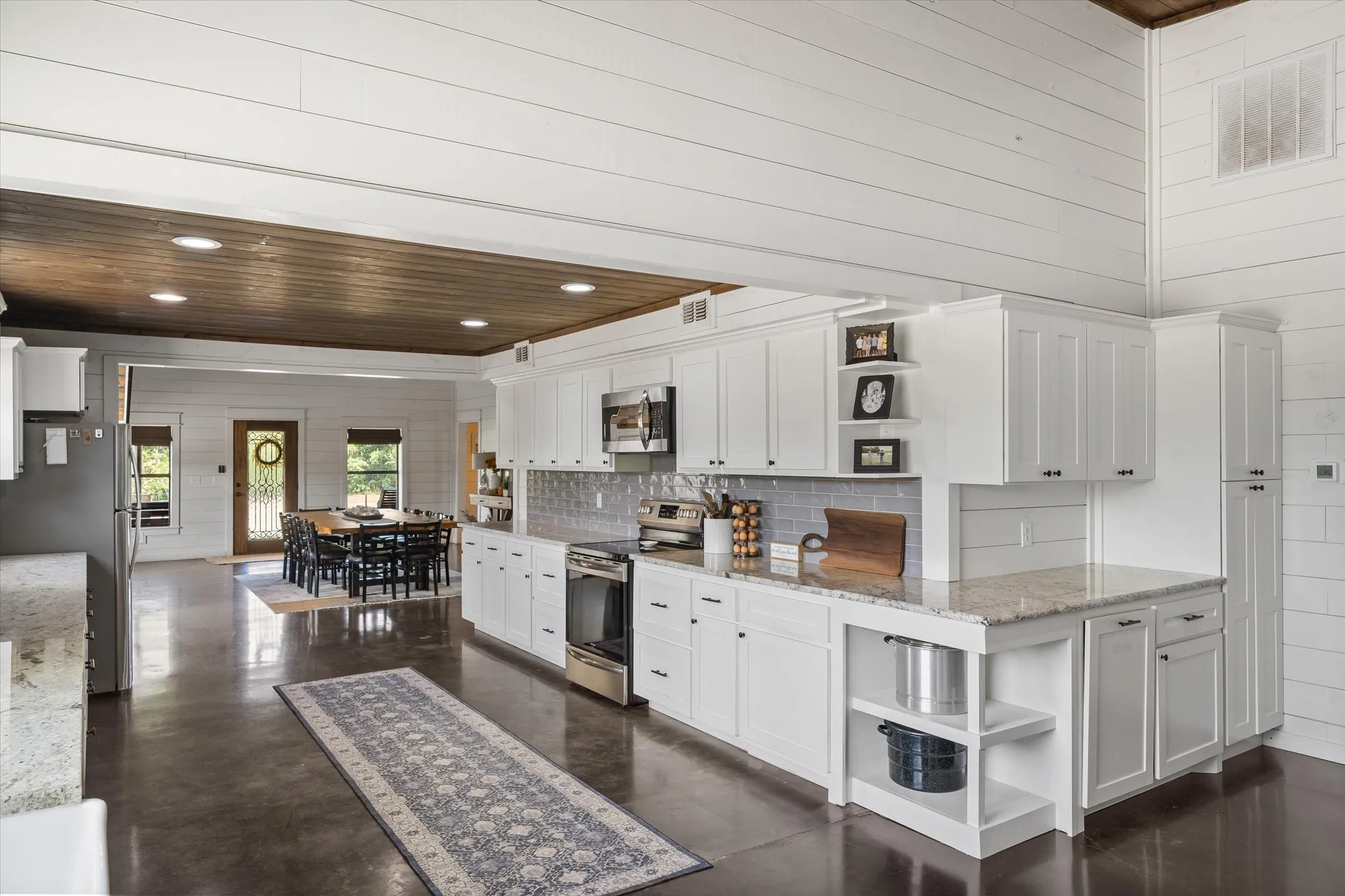 Galley style kitchen is the heart of the home and flows right into the living room and dining room