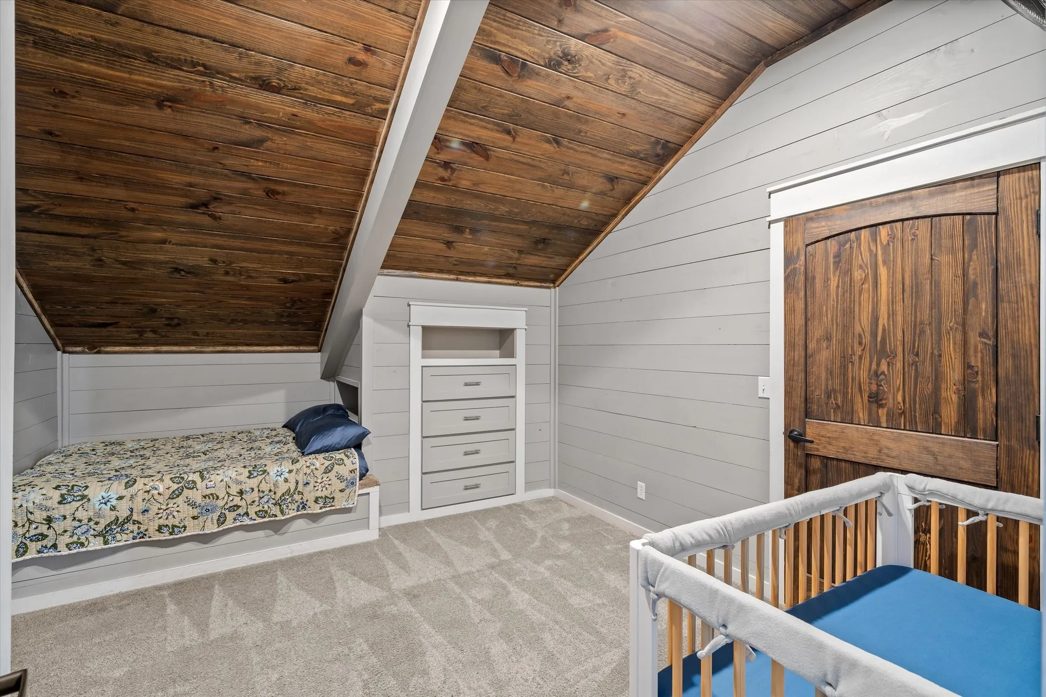 Bedroom 2 upstairs with built in chest of drawers and built in beds
