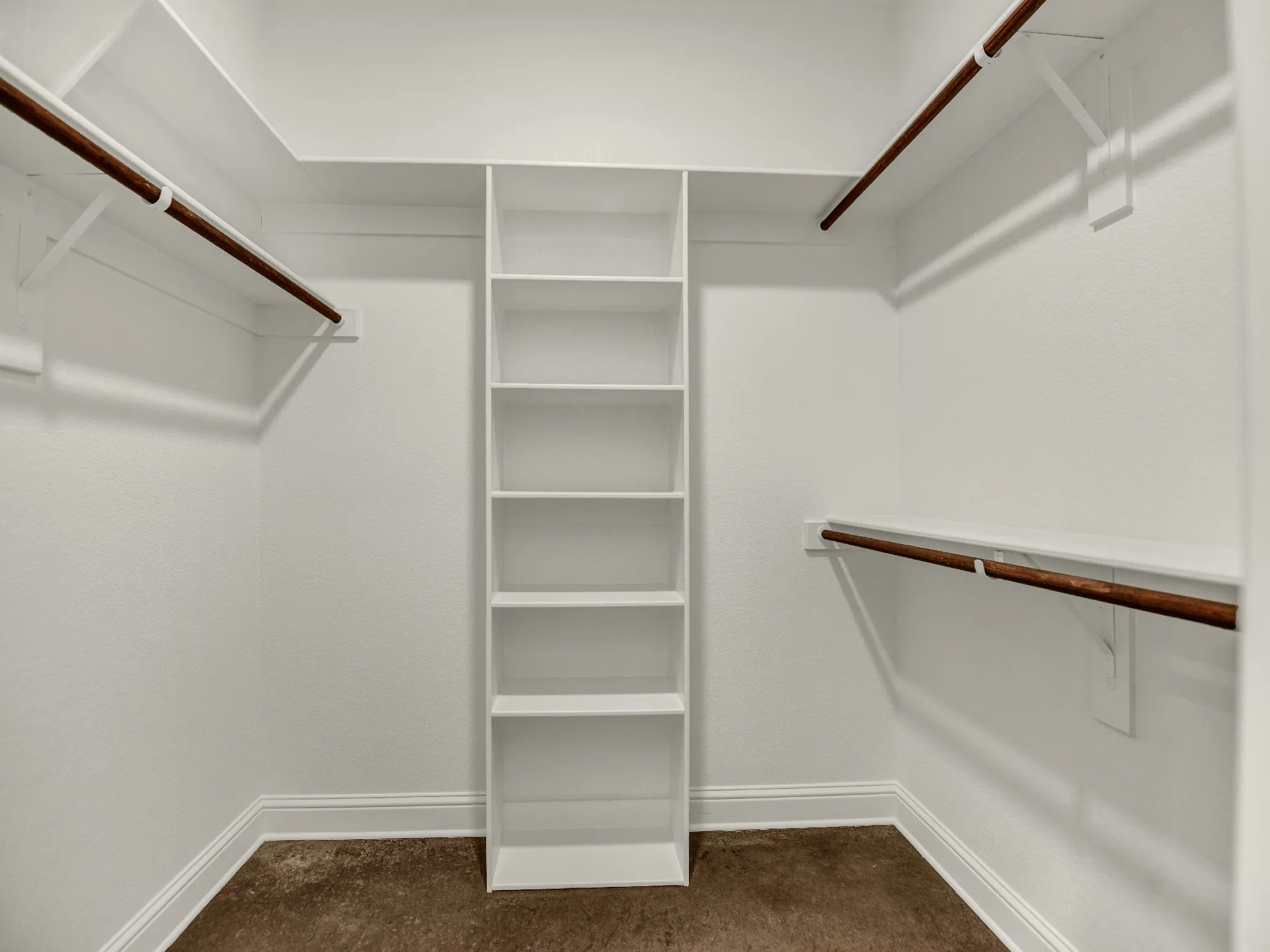 One of two primary bedroom closets