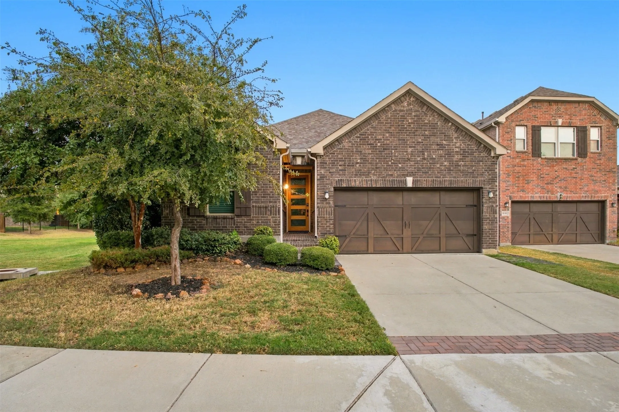 Brick exterior with a covered entry