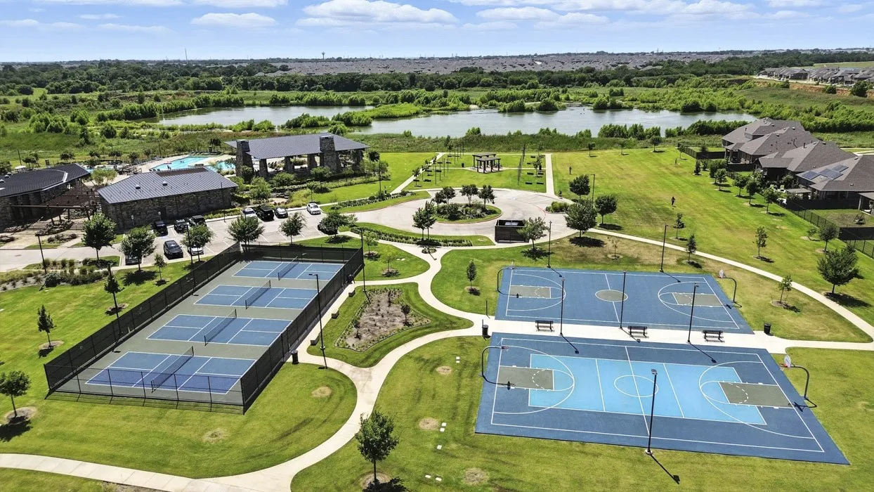 Community amenities including multiple sports courts, a swimming pool, and a clubhouse