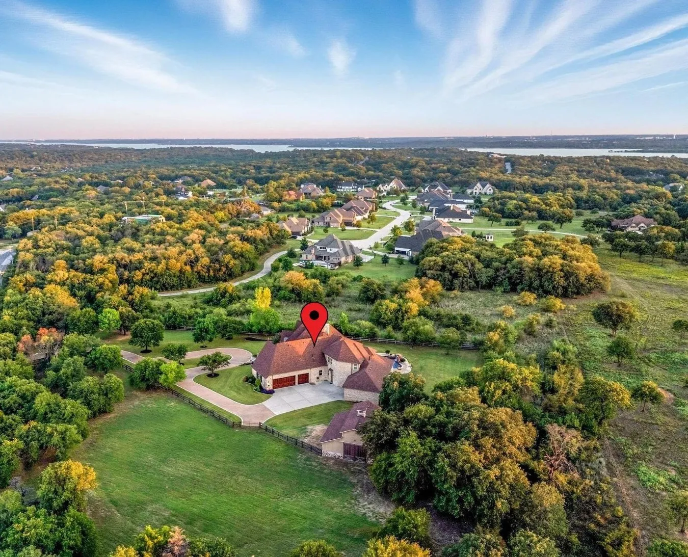 Surrounding greenery offers privacy & a getaway from the rest of the world. Fantastic location down the street from Rocky Point Trail, an equestrian trail, with easy access to Lake Grapevine & the popular Northshore Trails featuring 22+ miles for hiking, biking & walking.