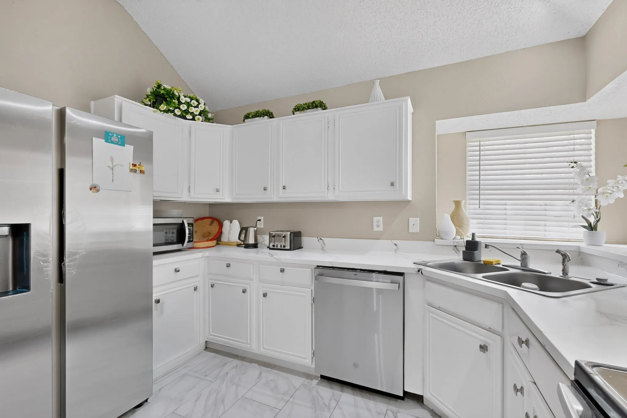 White cabinetry with modern hardware