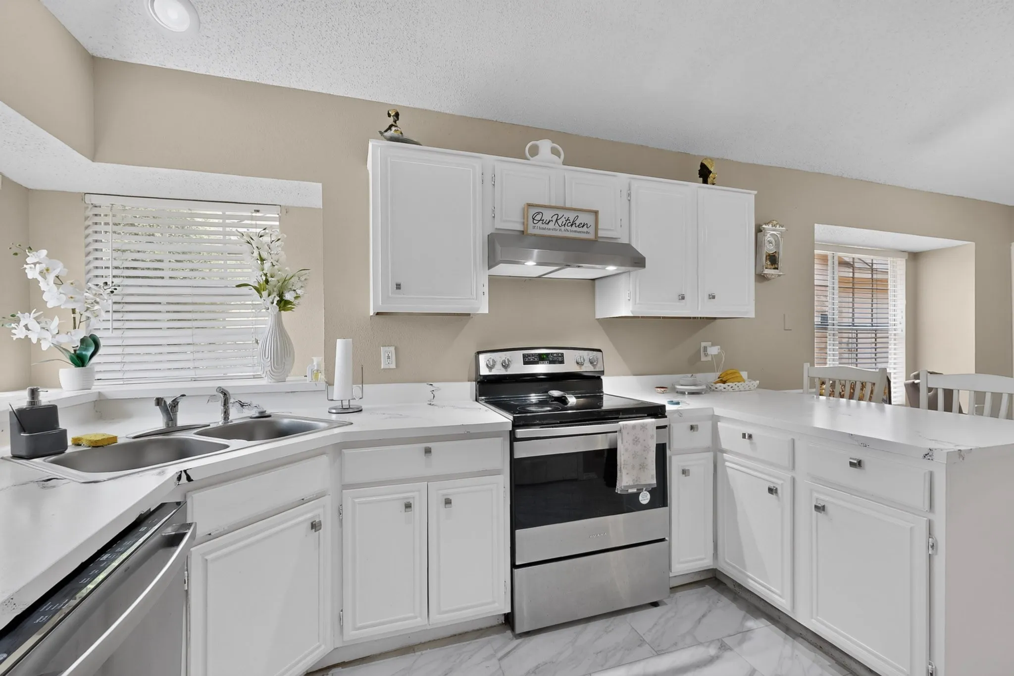 White cabinetry with brushed nickel hardware