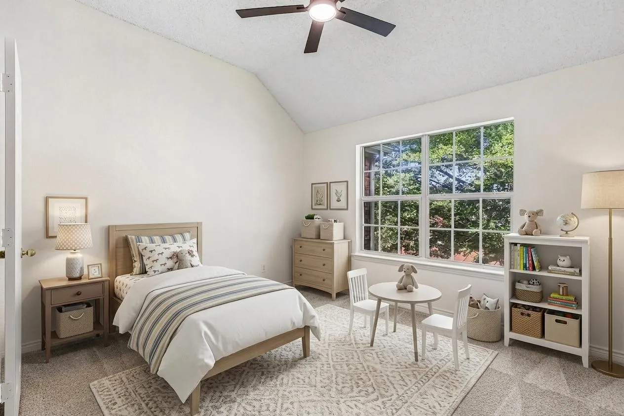 Spacious upstairs secondary bedroom offers abundant natural light and flexible space for a variety of needs. *Virtually Staged*
