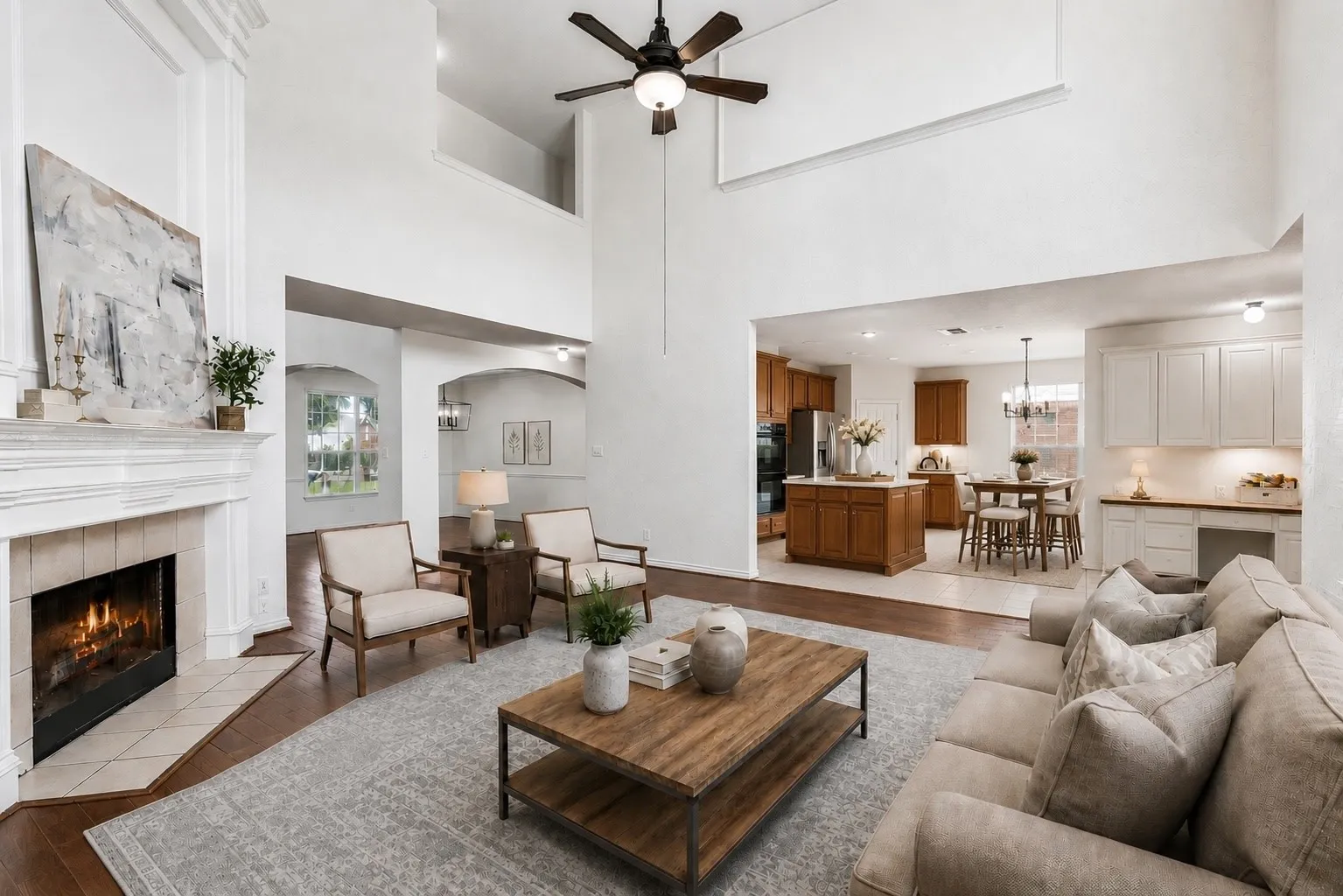 Open sightlines connect the family room, breakfast nook and kitchen for easy everyday living and entertaining. *Virtually Staged*