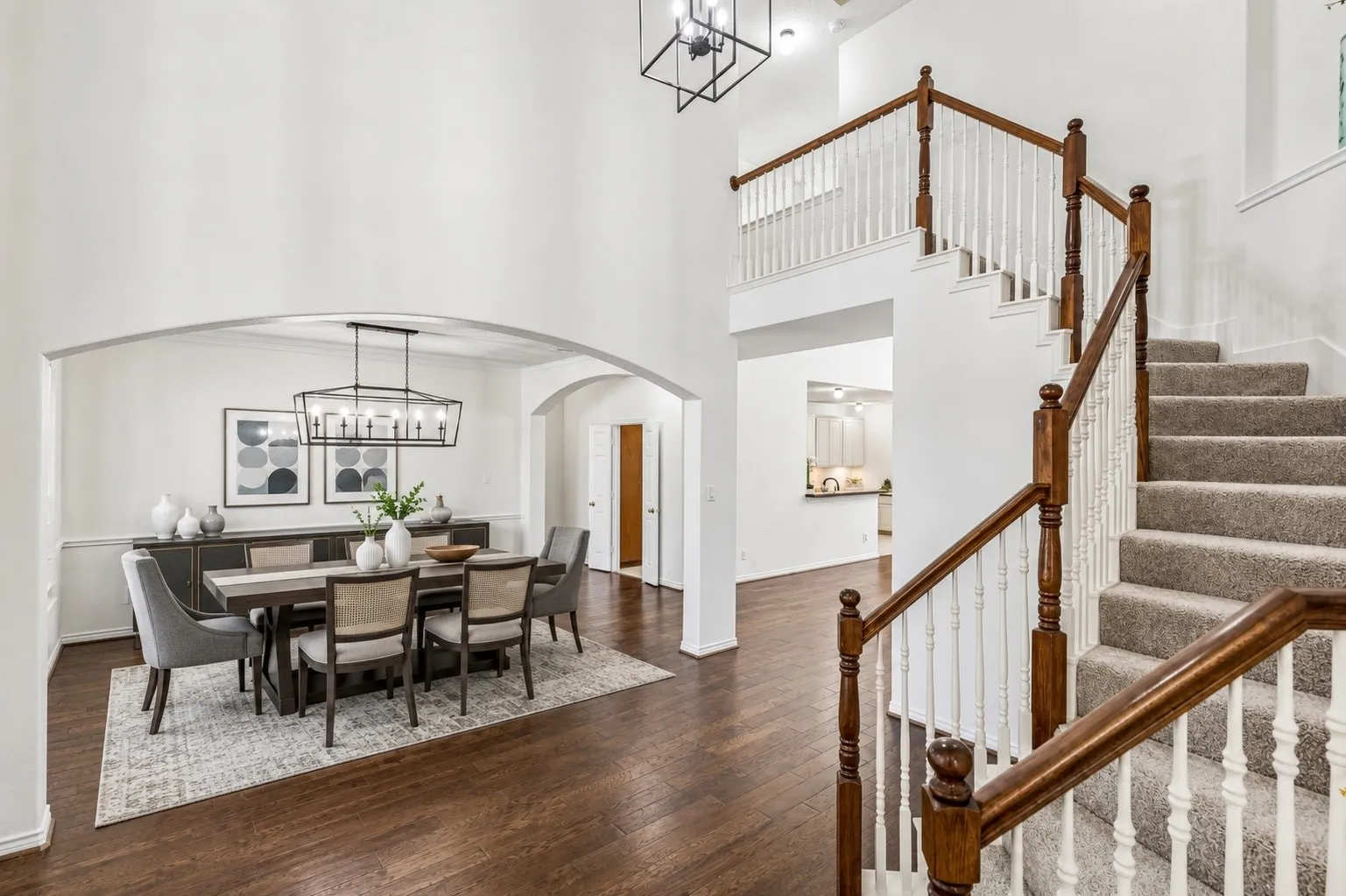 Separate dining room with updated accent lighting provides a dedicated space for entertaining and special gatherings. *Virtually Staged*