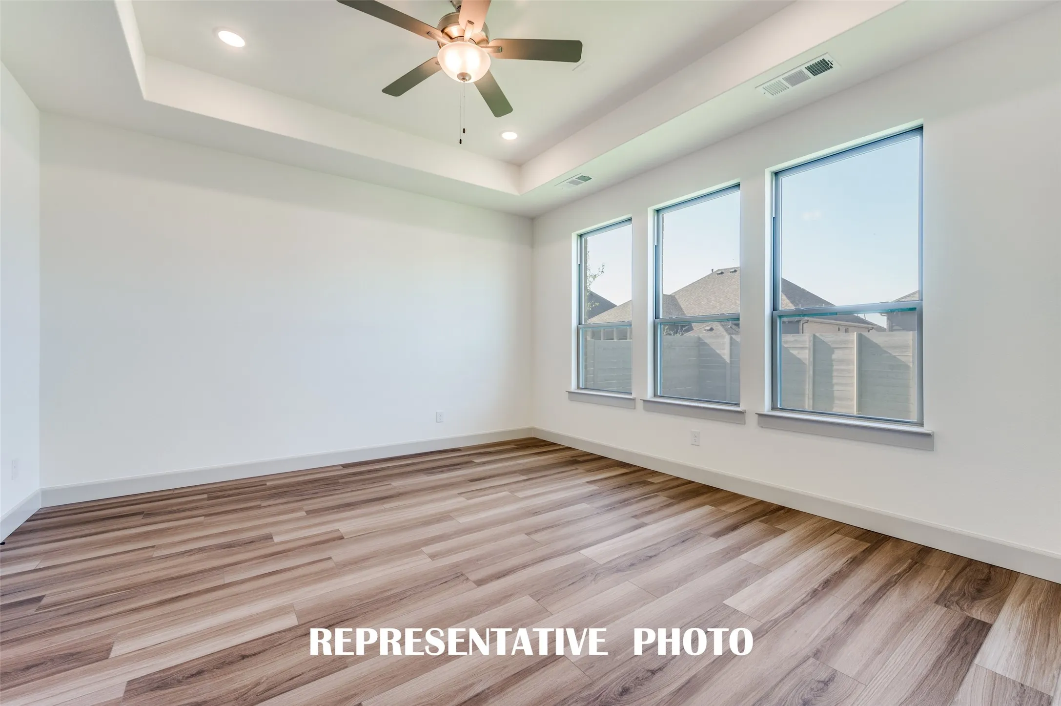 An owner's suite that offers gorgeous finishes, high ceilings, tons of natural light....our Brice floor plan has it all!  REPRESENTATIVE PHOTO