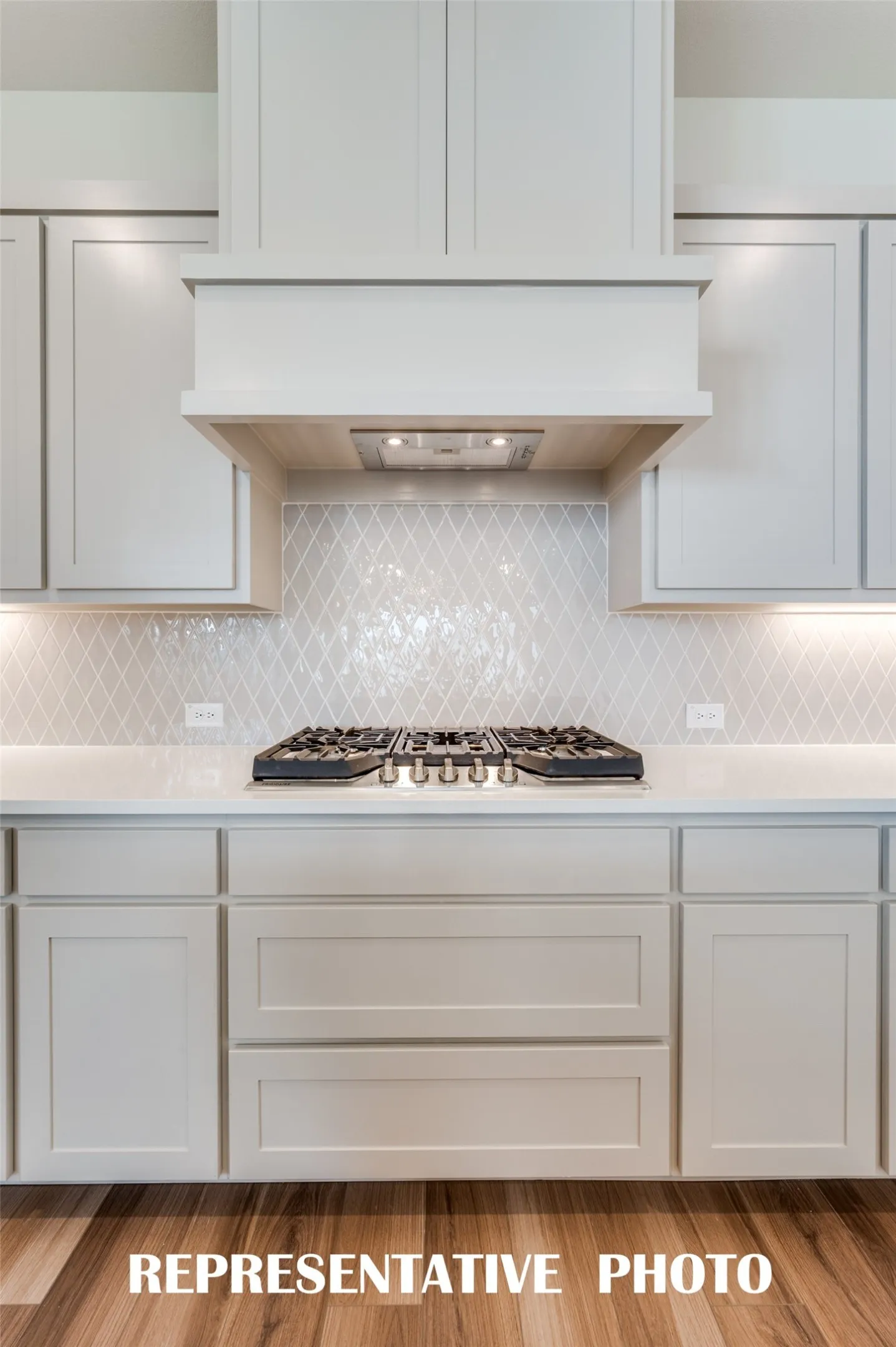 Beautiful finishes and thoughtful design elements are everywhere you look in this wonderfully designed kitchen!  REPRESENTATIVE PHOTO