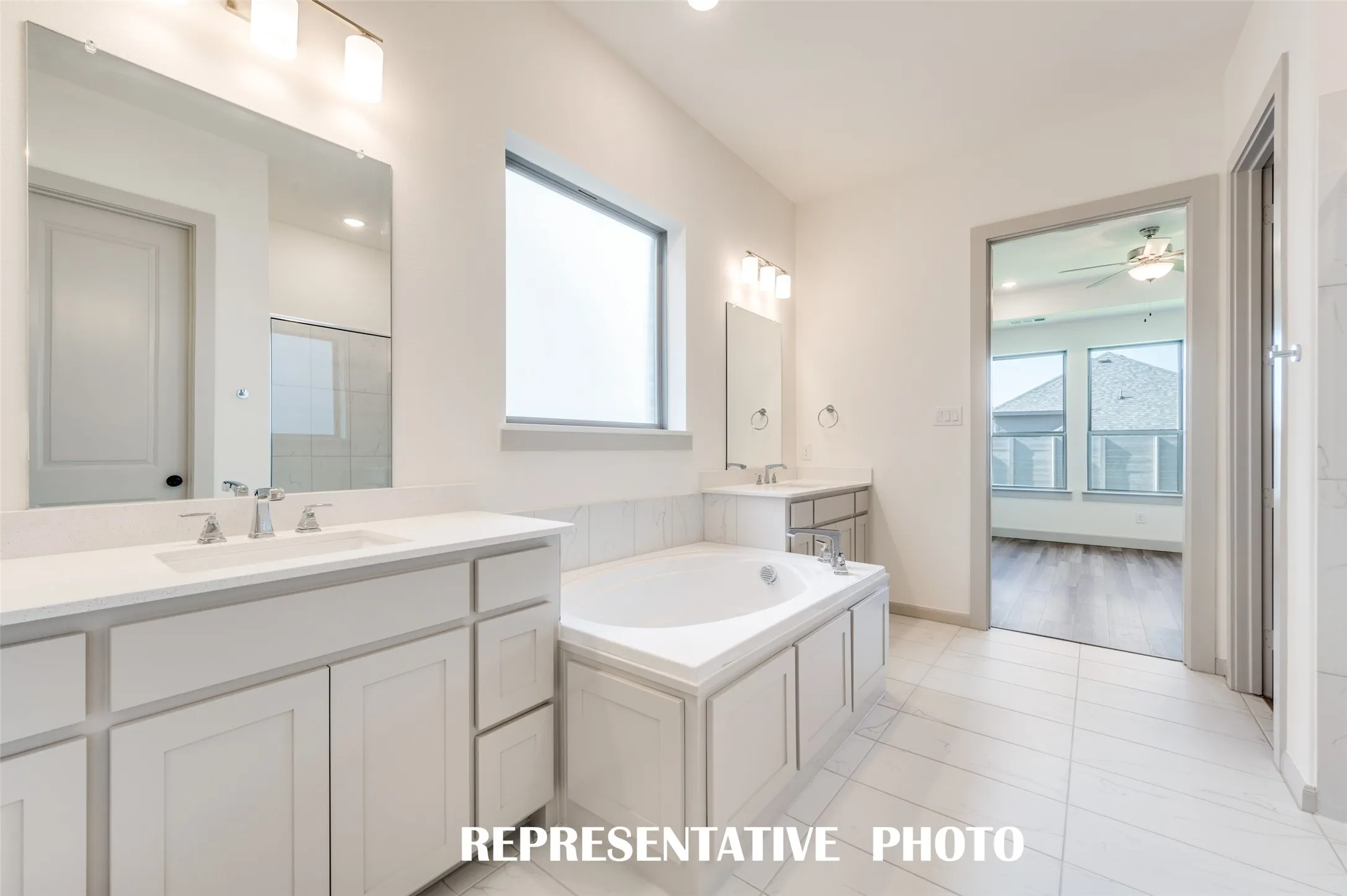 Plenty of space for two in this wonderful owner's bath.  REPRESENTATIVE PHOTO