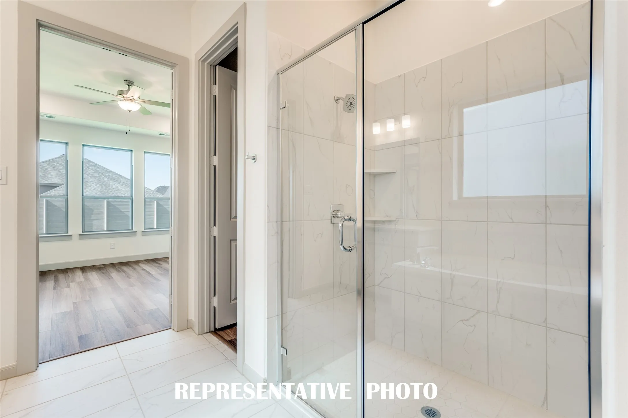 Your new owner's bath comes complete with a soaking tub and oversized, walk in shower!  REPRESENTATIVE PHOTO