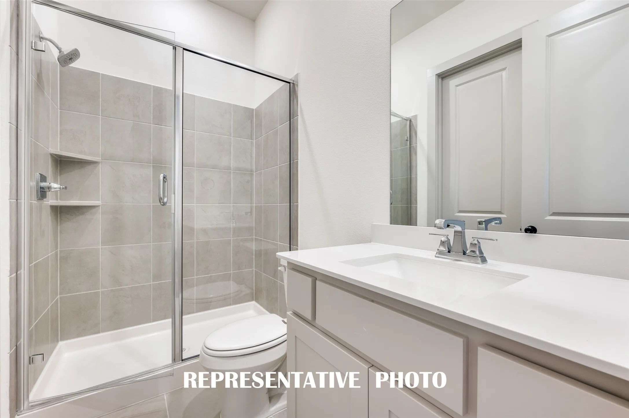 Guests will feel right at home in either of the beautifully finished guest baths our Brice floor plan has to offer.  REPRESENTATIVE PHOTO